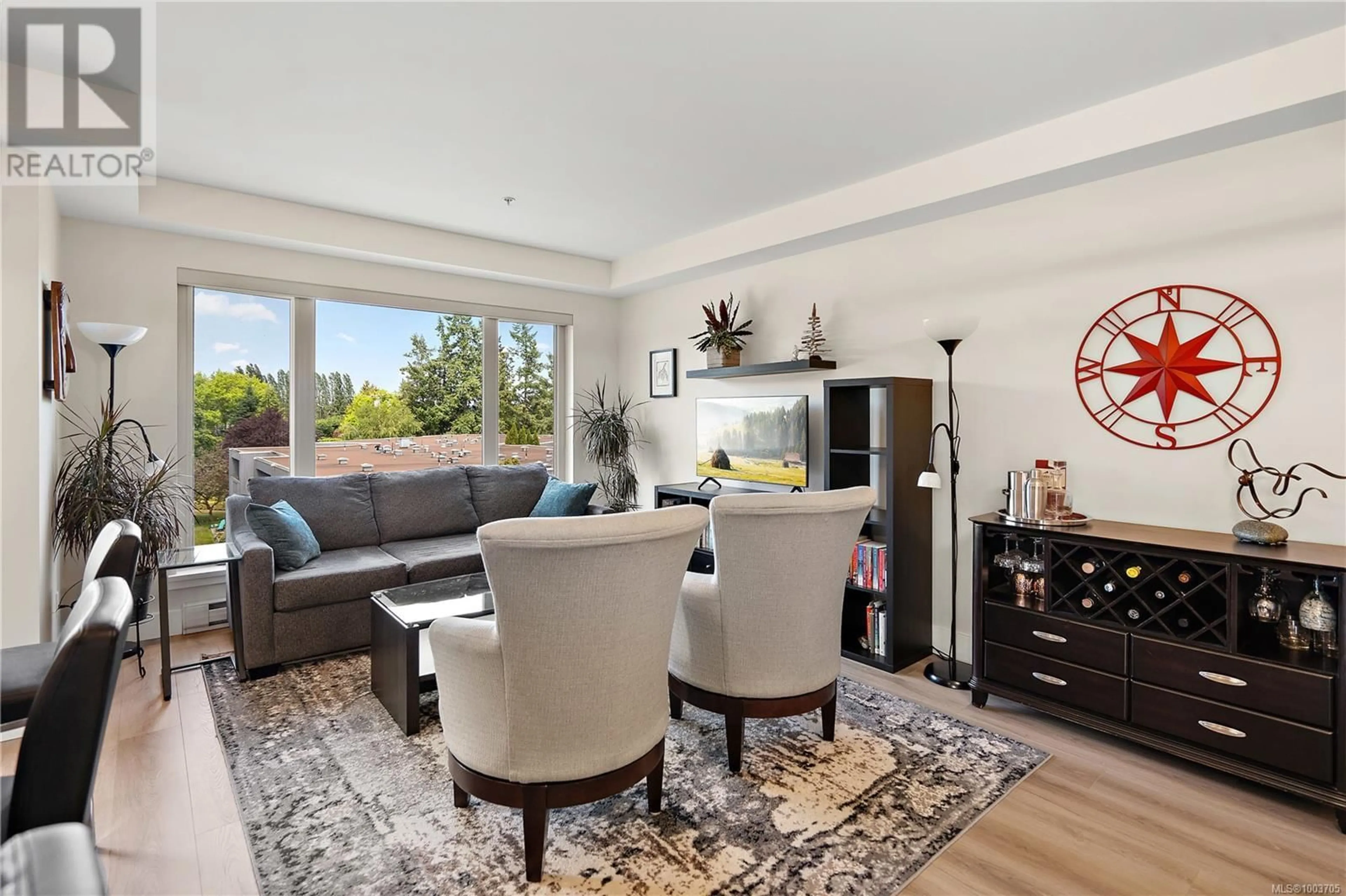 Living room with furniture, unknown for 302 - 7161 WEST SAANICH ROAD, Central Saanich British Columbia V8M1P7