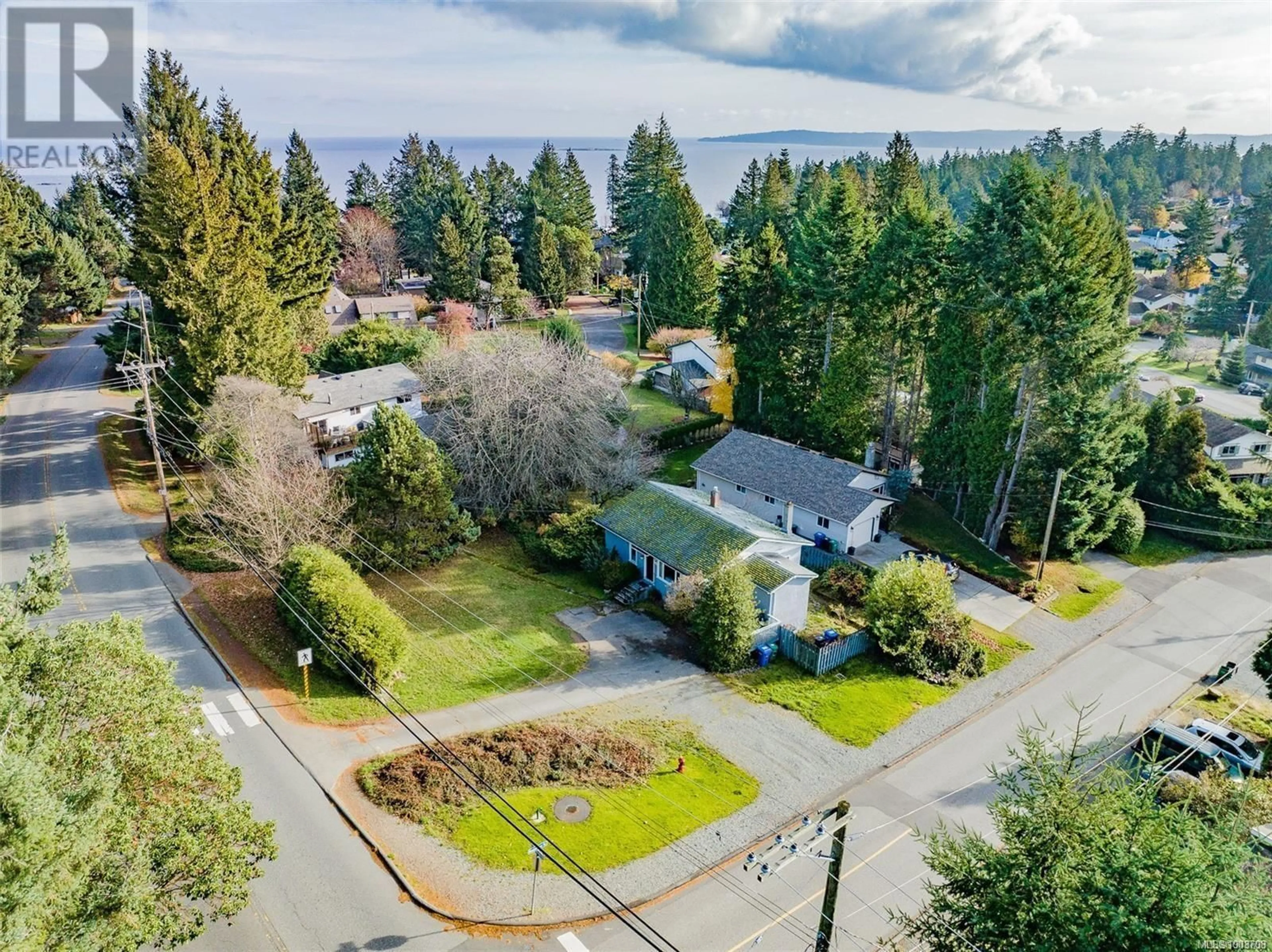 A pic from outside/outdoor area/front of a property/back of a property/a pic from drone, unknown for 3500 HAMMOND BAY ROAD, Nanaimo British Columbia V9T3E5
