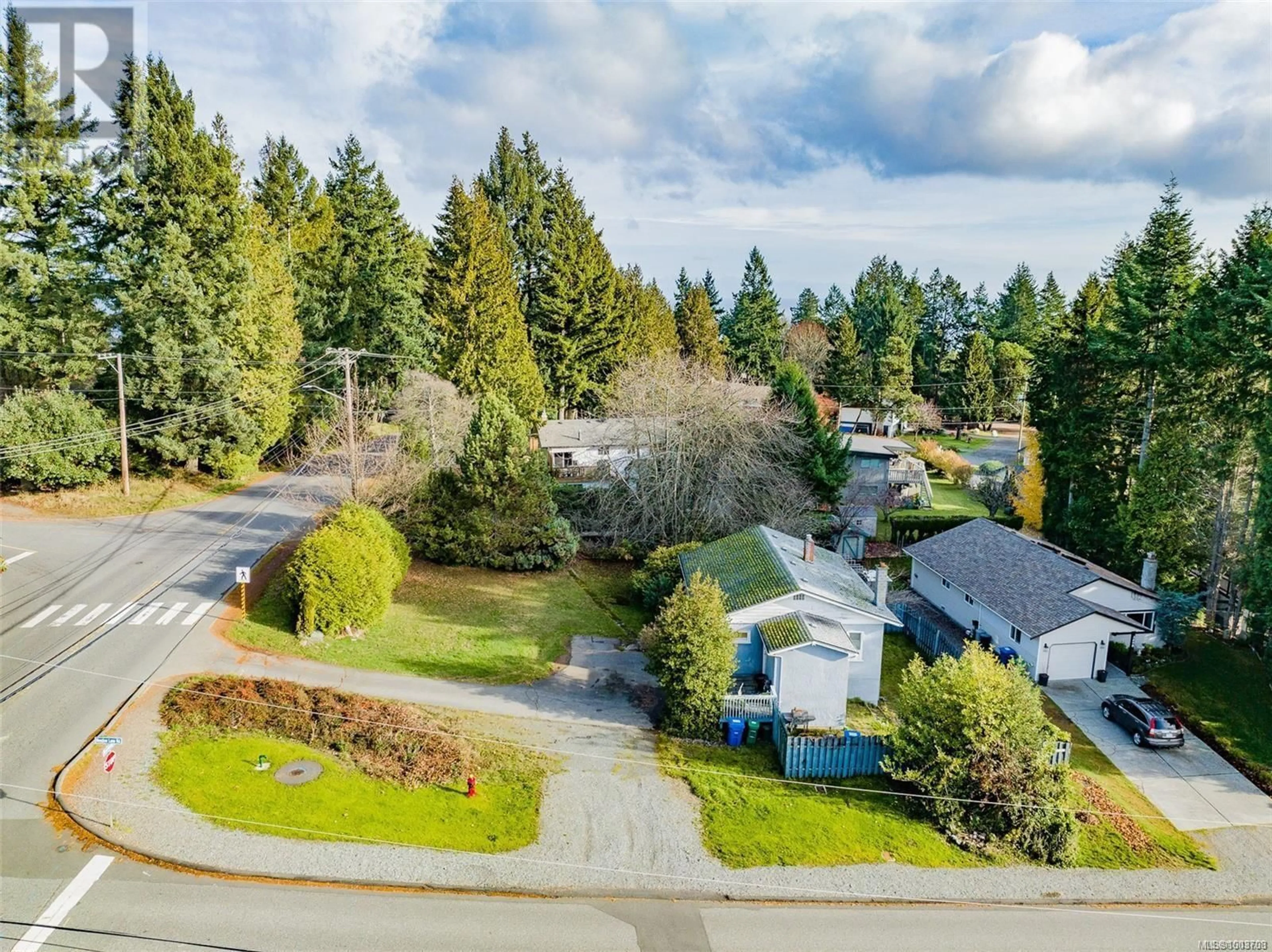 A pic from outside/outdoor area/front of a property/back of a property/a pic from drone, unknown for 3500 HAMMOND BAY ROAD, Nanaimo British Columbia V9T3E5