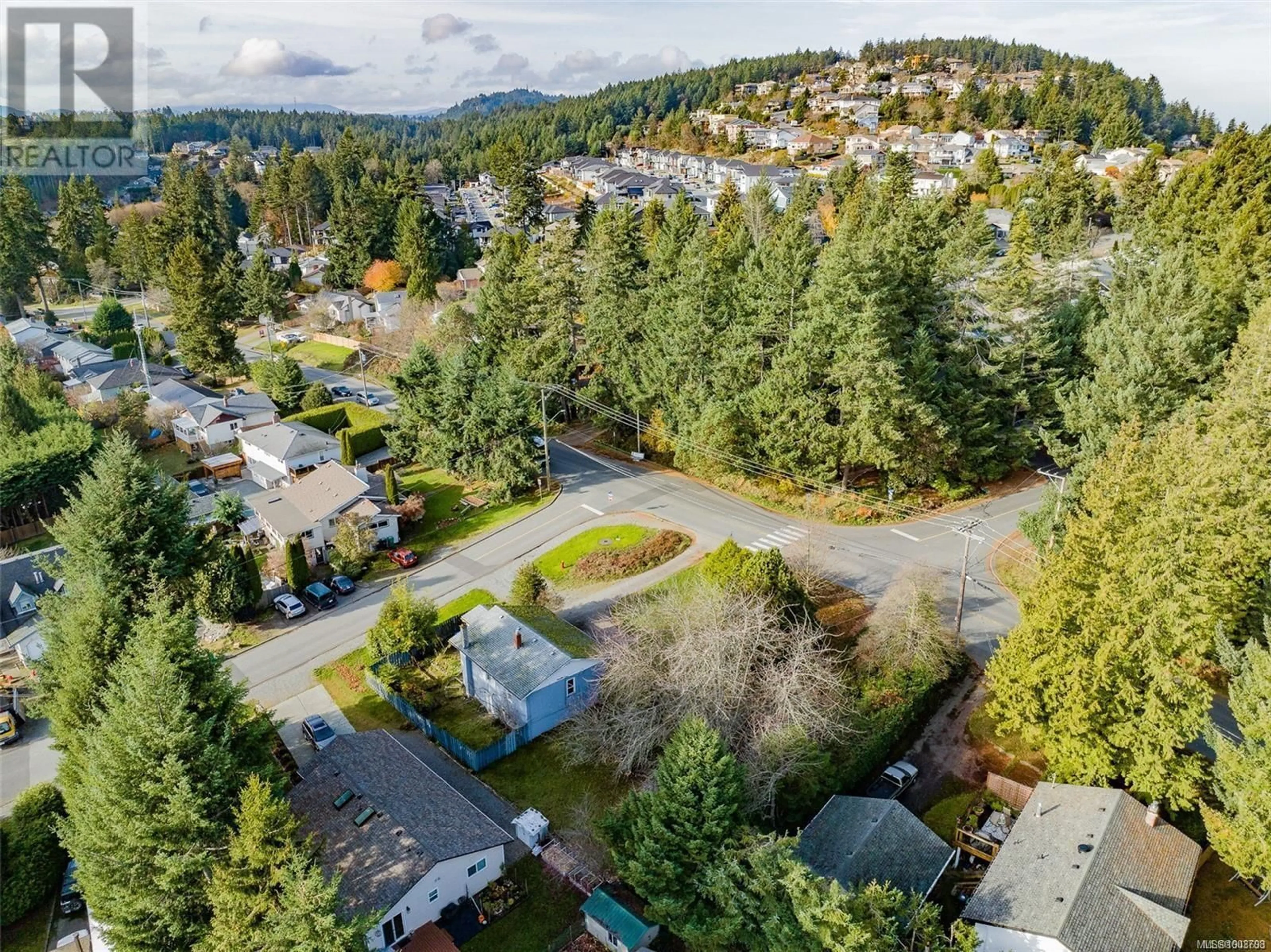 A pic from outside/outdoor area/front of a property/back of a property/a pic from drone, unknown for 3500 HAMMOND BAY ROAD, Nanaimo British Columbia V9T3E5