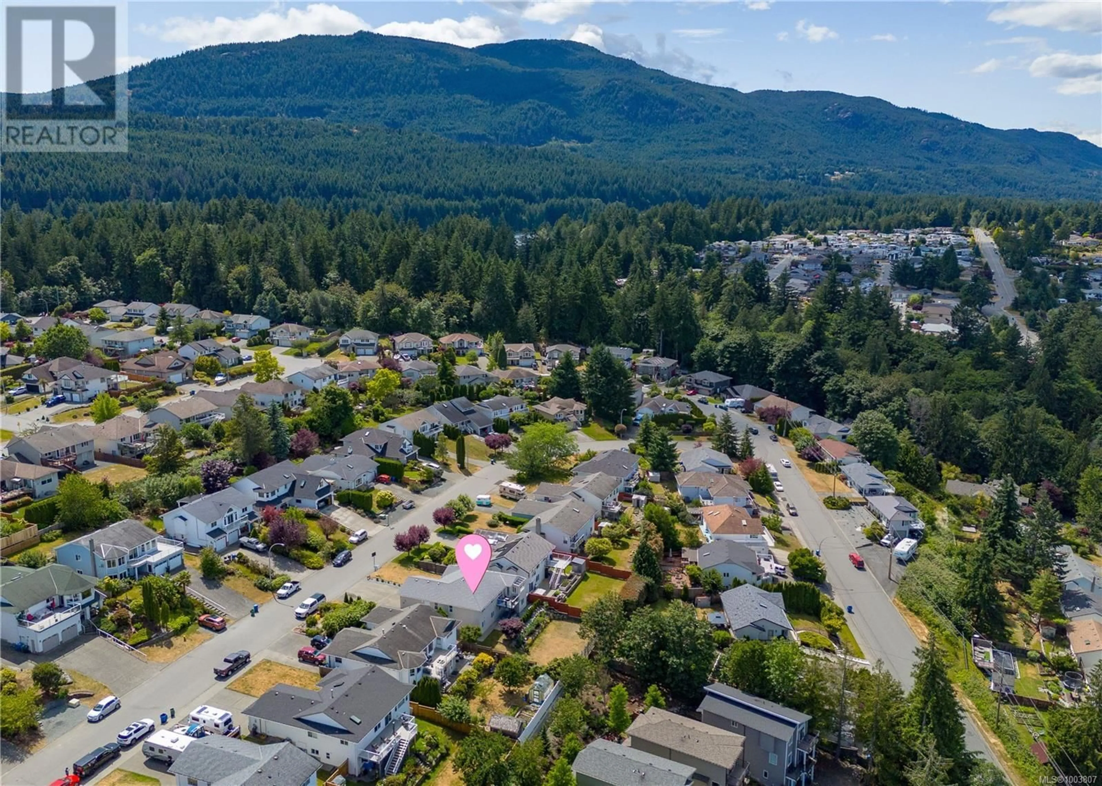 A pic from outside/outdoor area/front of a property/back of a property/a pic from drone, mountain view for 2164 WOODTHRUSH PLACE, Nanaimo British Columbia V9T6V2