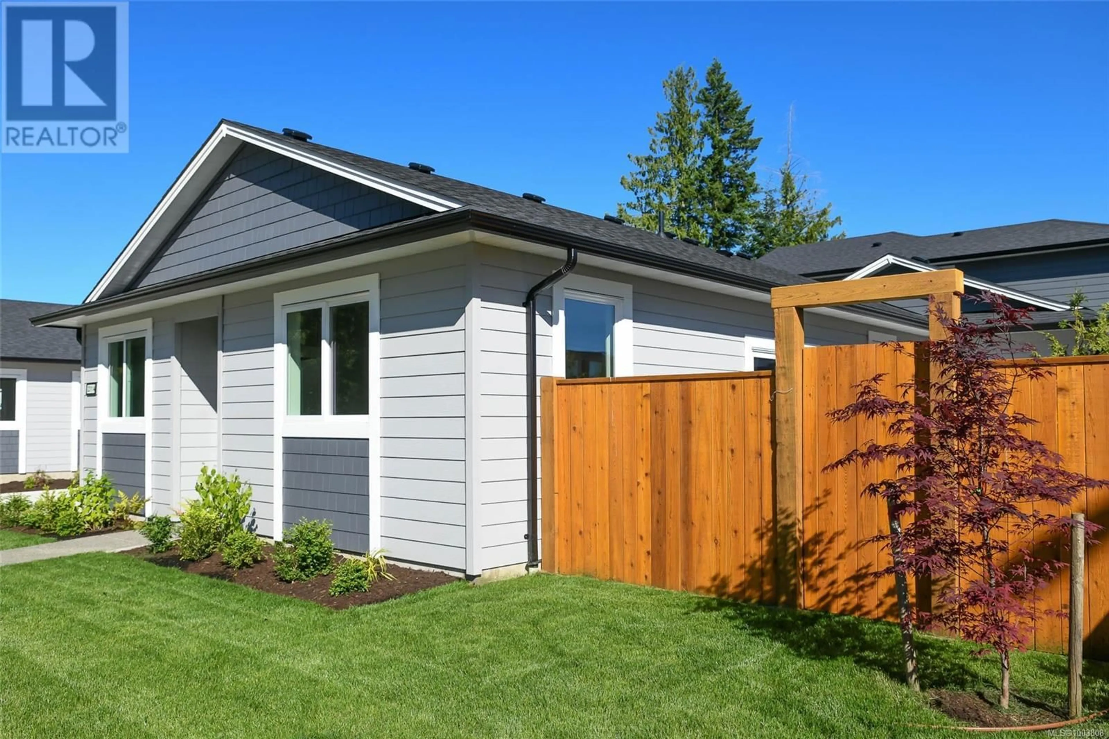 Home with vinyl exterior material, street for A - 2311 MCDONALD ROAD, Comox British Columbia V9M0C8