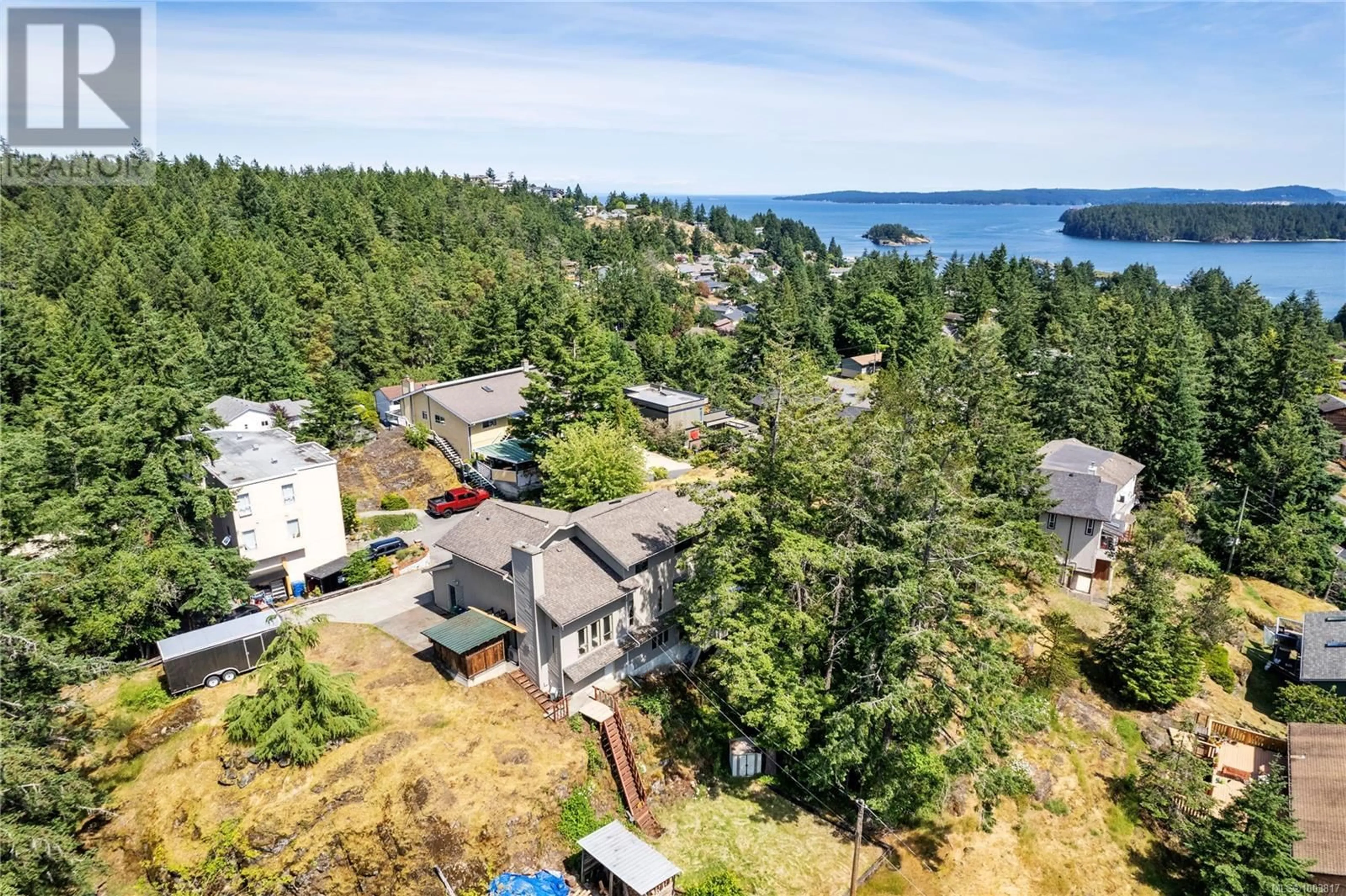 A pic from outside/outdoor area/front of a property/back of a property/a pic from drone, water/lake/river/ocean view for 3148 ROBIN HOOD DRIVE, Nanaimo British Columbia V9T1P1