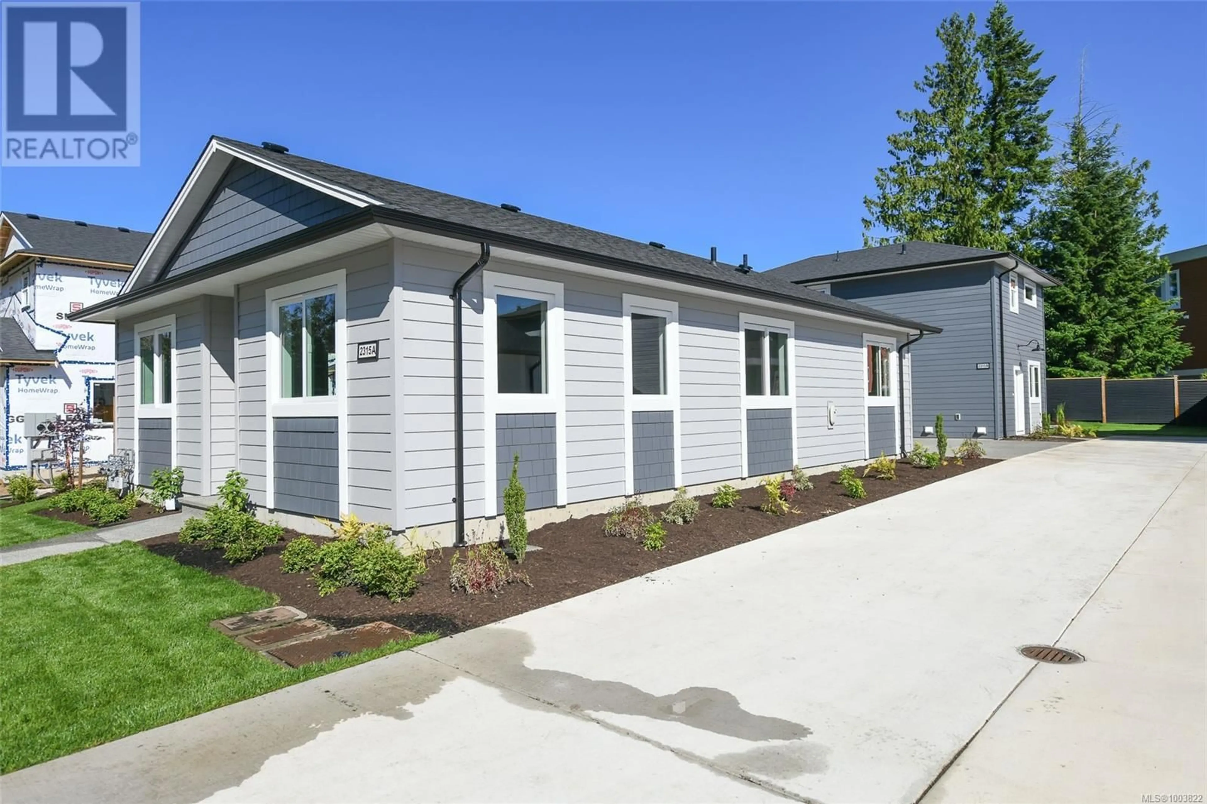 Home with vinyl exterior material, street for A - 2315 MCDONALD ROAD, Comox British Columbia V9M0C8