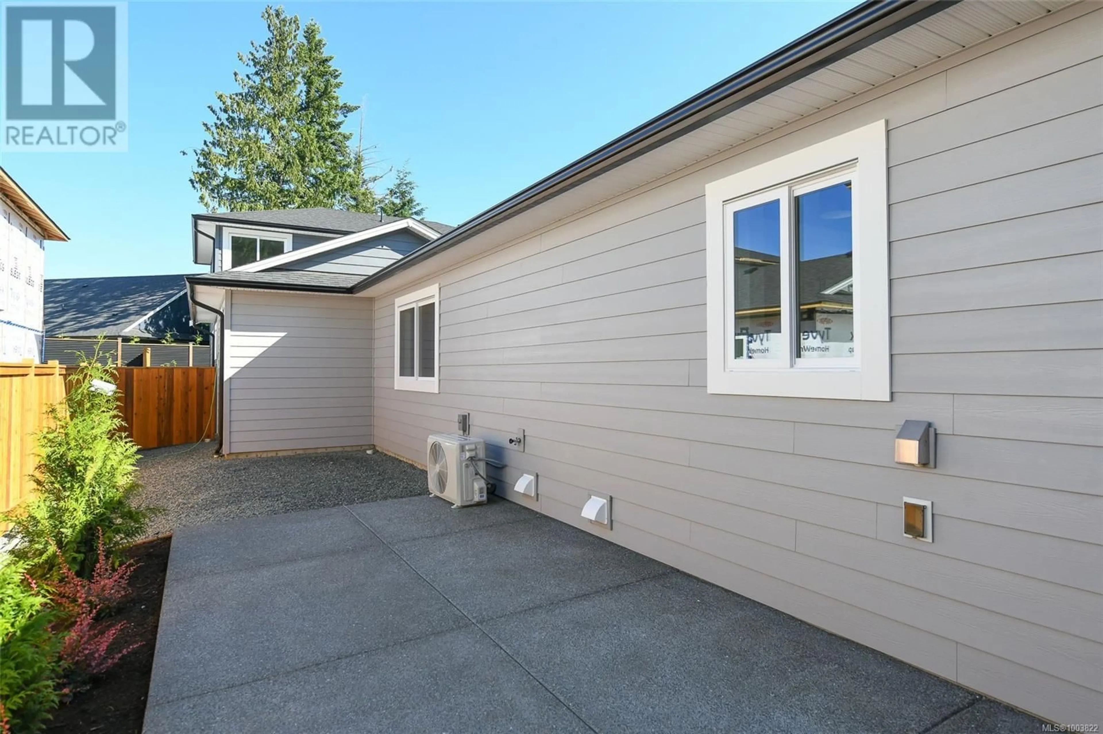 Home with vinyl exterior material, street for A - 2315 MCDONALD ROAD, Comox British Columbia V9M0C8