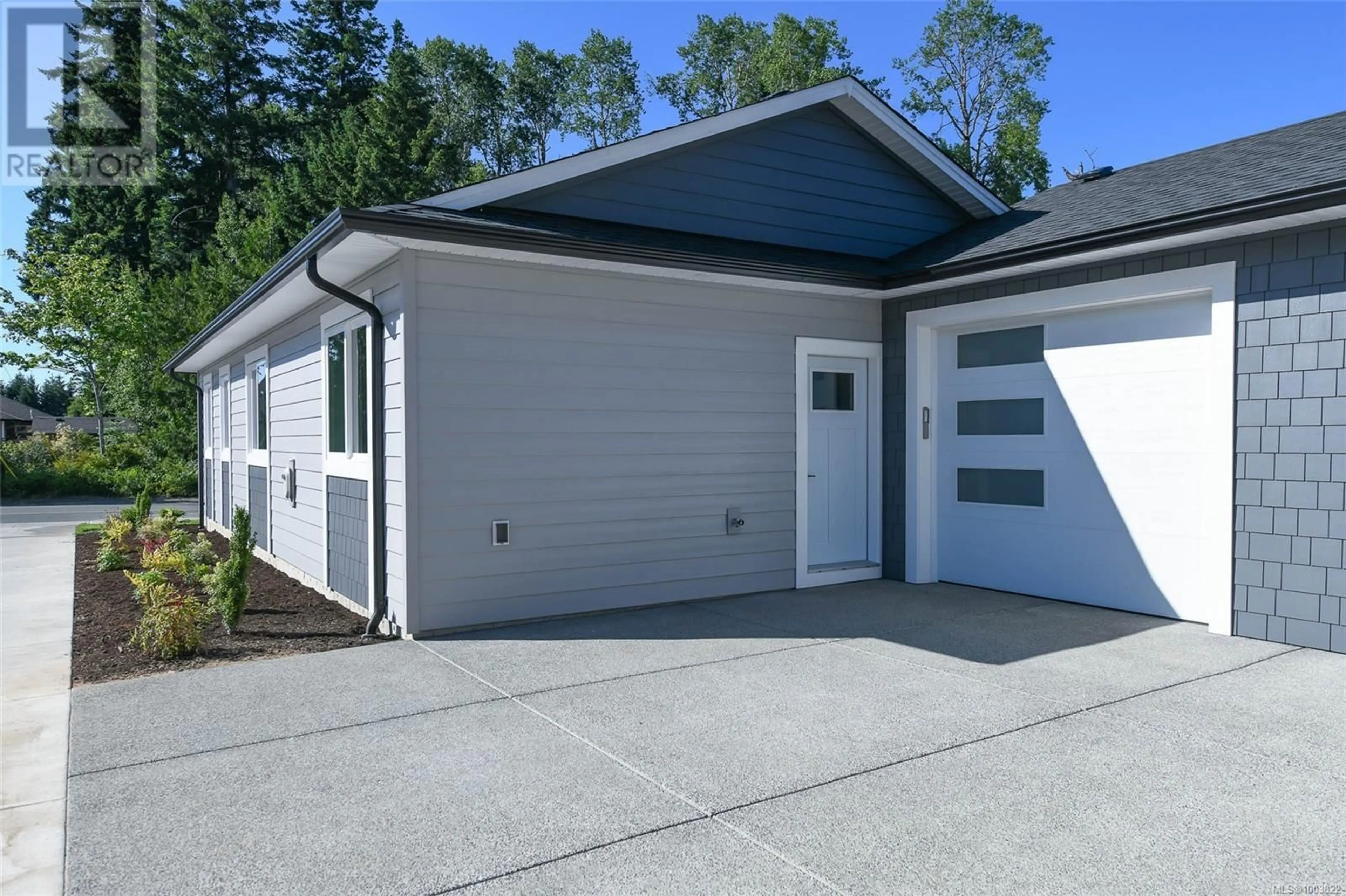 Home with vinyl exterior material, street for A - 2315 MCDONALD ROAD, Comox British Columbia V9M0C8