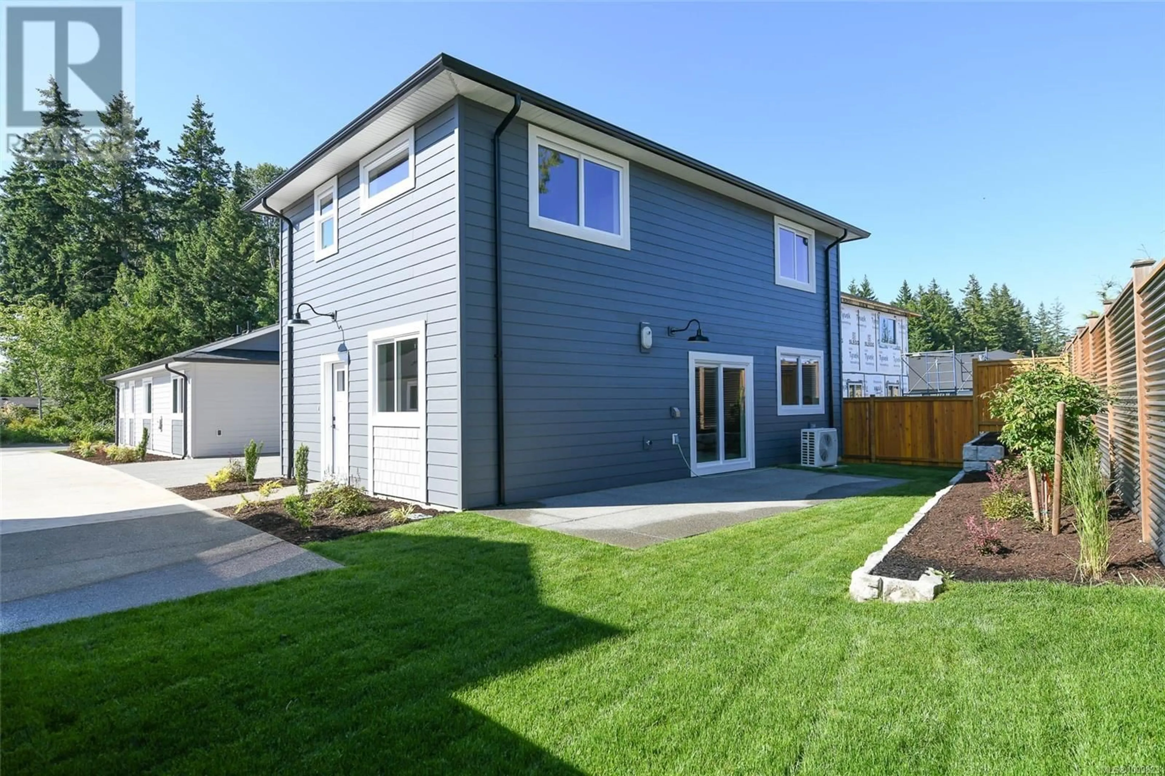 Home with vinyl exterior material, street for B - 2315 MCDONALD ROAD, Comox British Columbia V9M0C8
