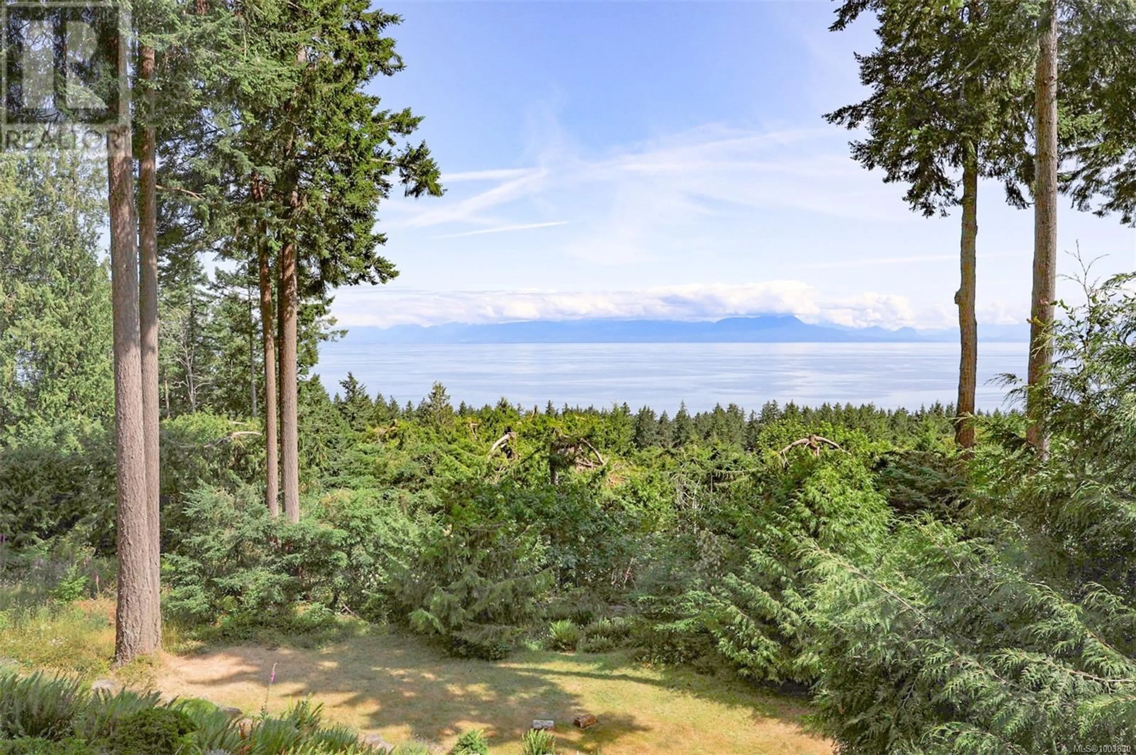 A pic from outside/outdoor area/front of a property/back of a property/a pic from drone, forest/trees view for 1438 WILD CHERRY TERRACE, Gabriola Island British Columbia V0R1X5