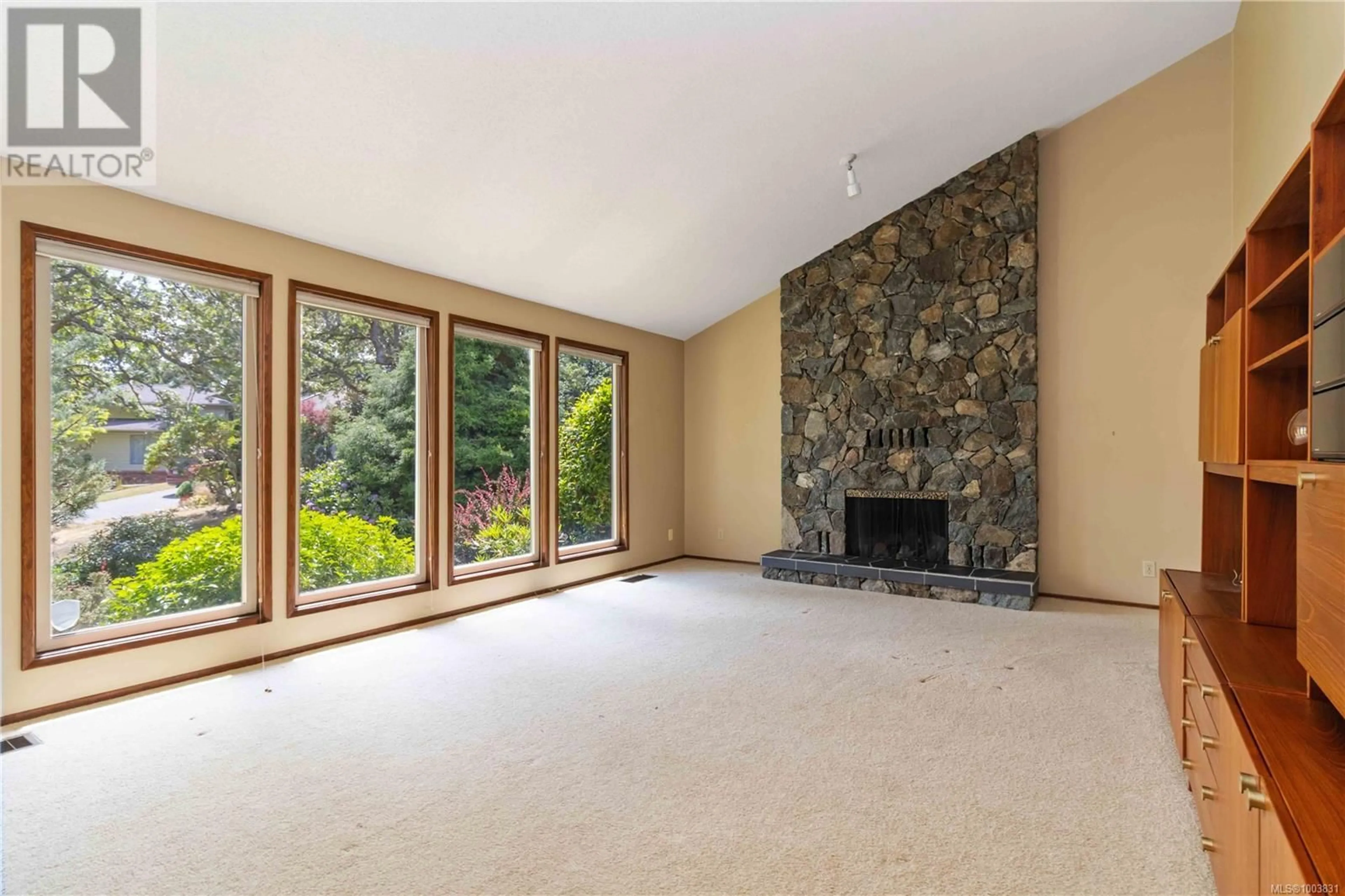 Living room with furniture, unknown for 1560 ORELTON PLACE, Saanich British Columbia V8N5S7
