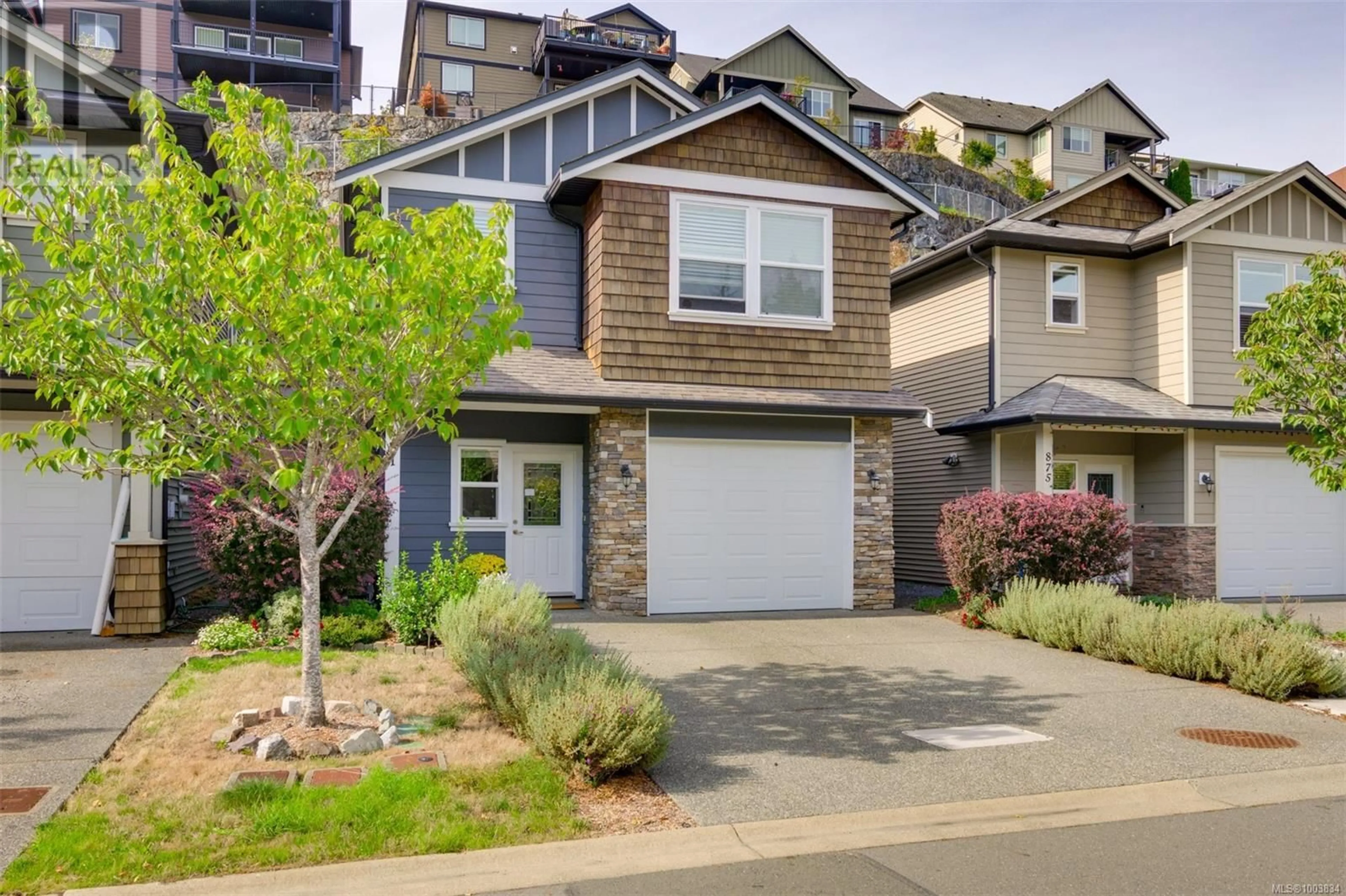 Home with vinyl exterior material, street for 871 WILD RIDGE WAY, Langford British Columbia V9C4M8