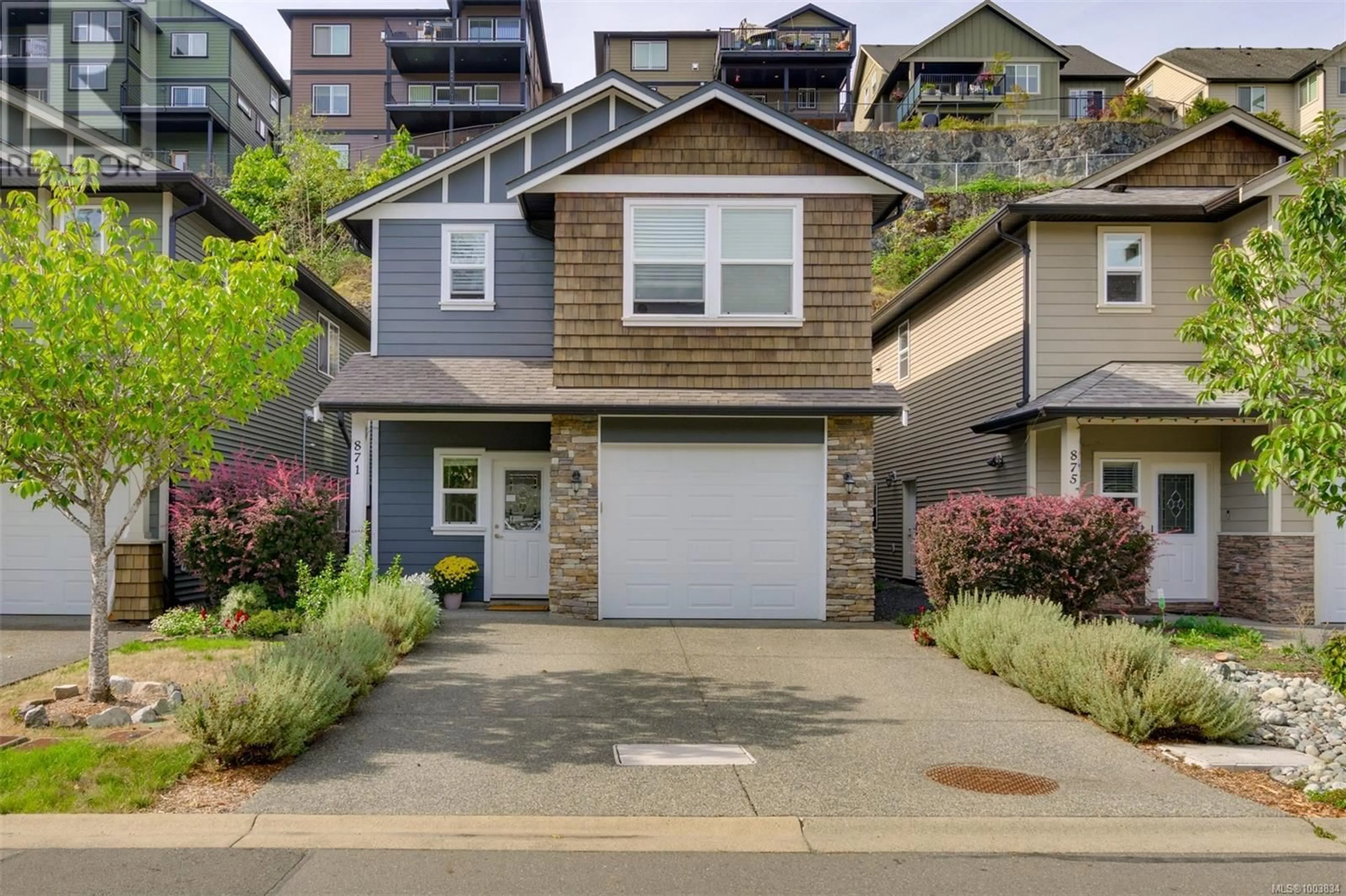Home with vinyl exterior material, street for 871 WILD RIDGE WAY, Langford British Columbia V9C4M8