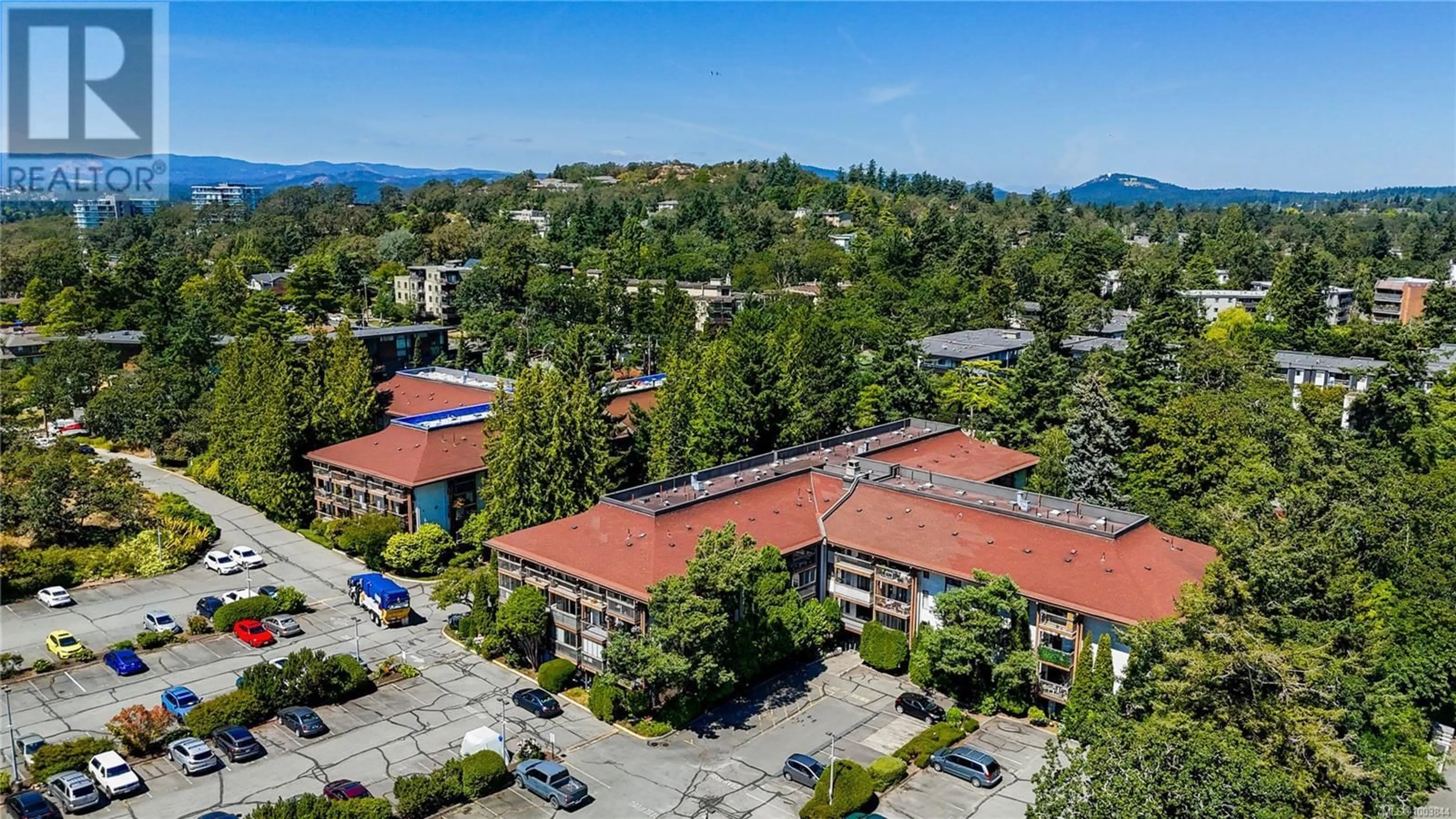 A pic from outside/outdoor area/front of a property/back of a property/a pic from drone, mountain view for 308 - 1009 MCKENZIE AVENUE, Saanich British Columbia V8X4B1