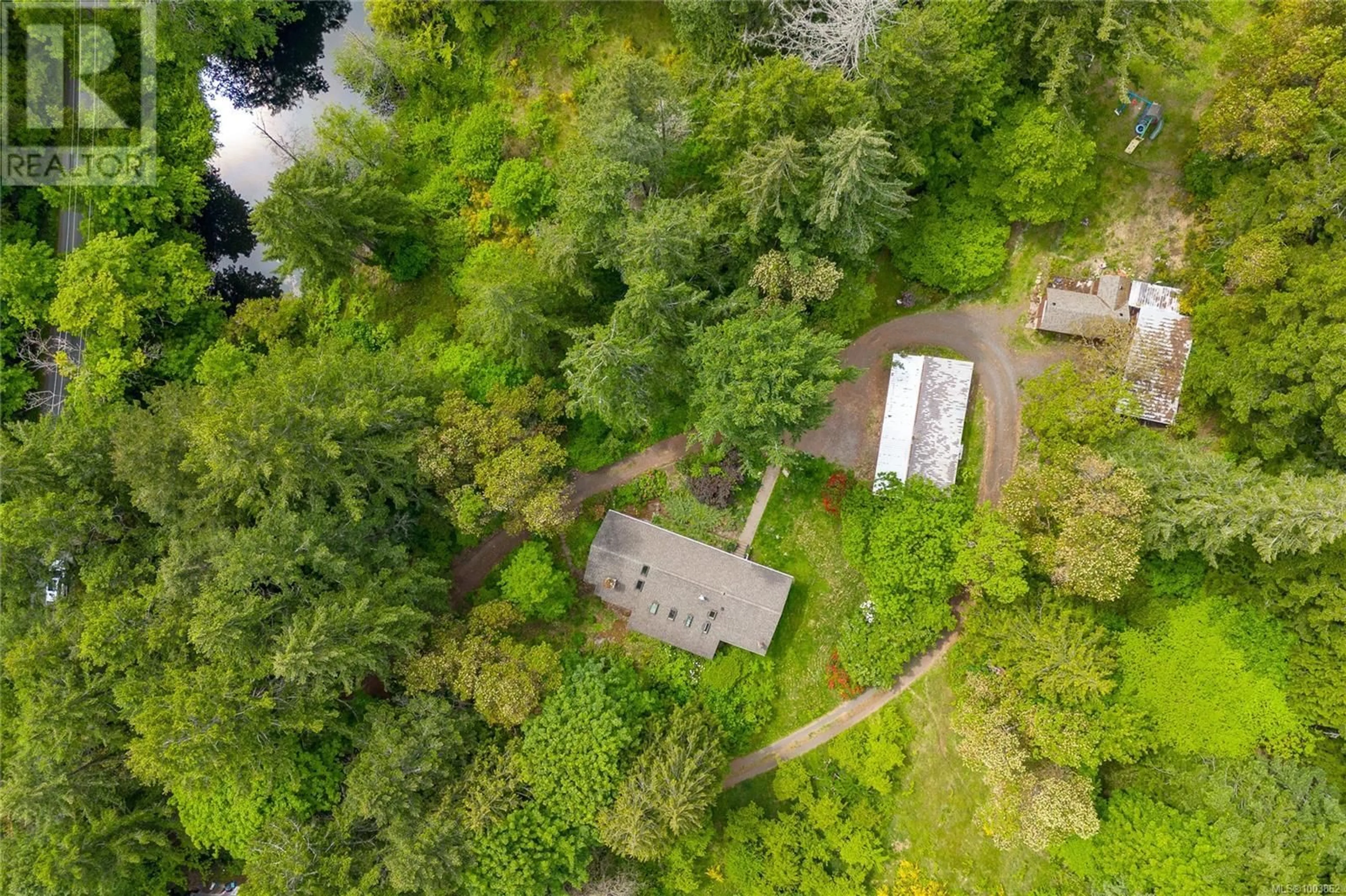 A pic from outside/outdoor area/front of a property/back of a property/a pic from drone, forest/trees view for 456 SPARTON ROAD, Saanich British Columbia V9E2H4