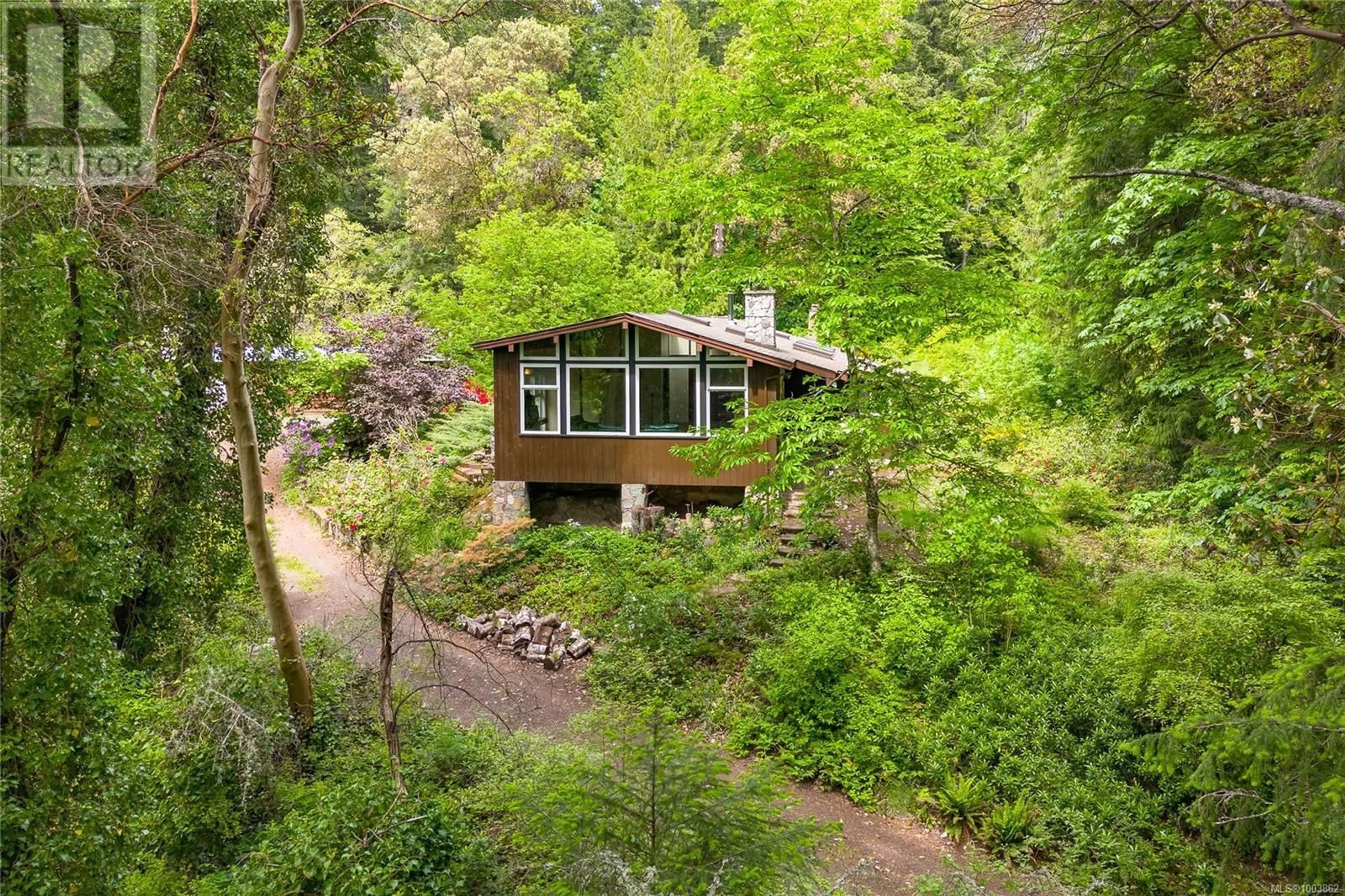 A pic from outside/outdoor area/front of a property/back of a property/a pic from drone, forest/trees view for 456 SPARTON ROAD, Saanich British Columbia V9E2H4