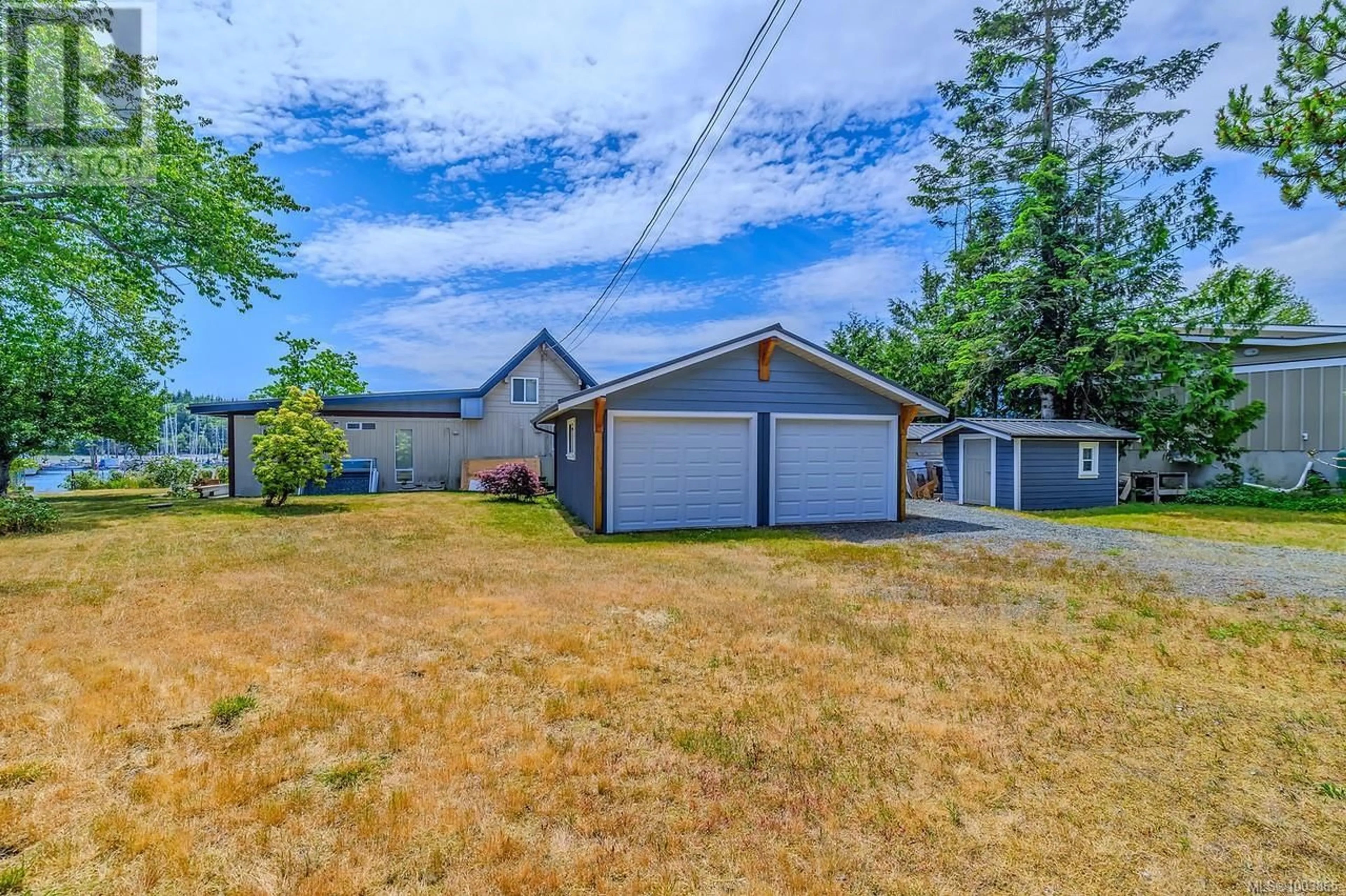 A pic from outside/outdoor area/front of a property/back of a property/a pic from drone, street for 5492 DEEP BAY DRIVE, Bowser British Columbia V0R1G0