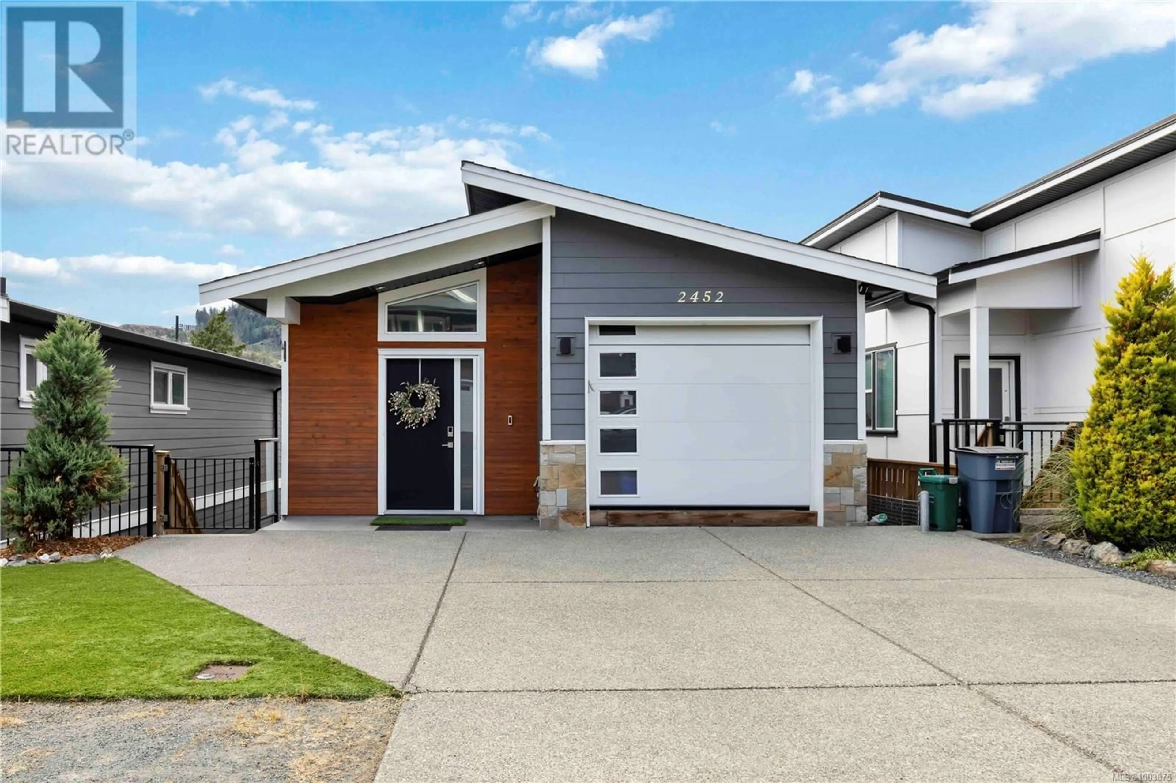 Home with vinyl exterior material, street for 2452 PROSPECTOR WAY, Langford British Columbia V9B5X6