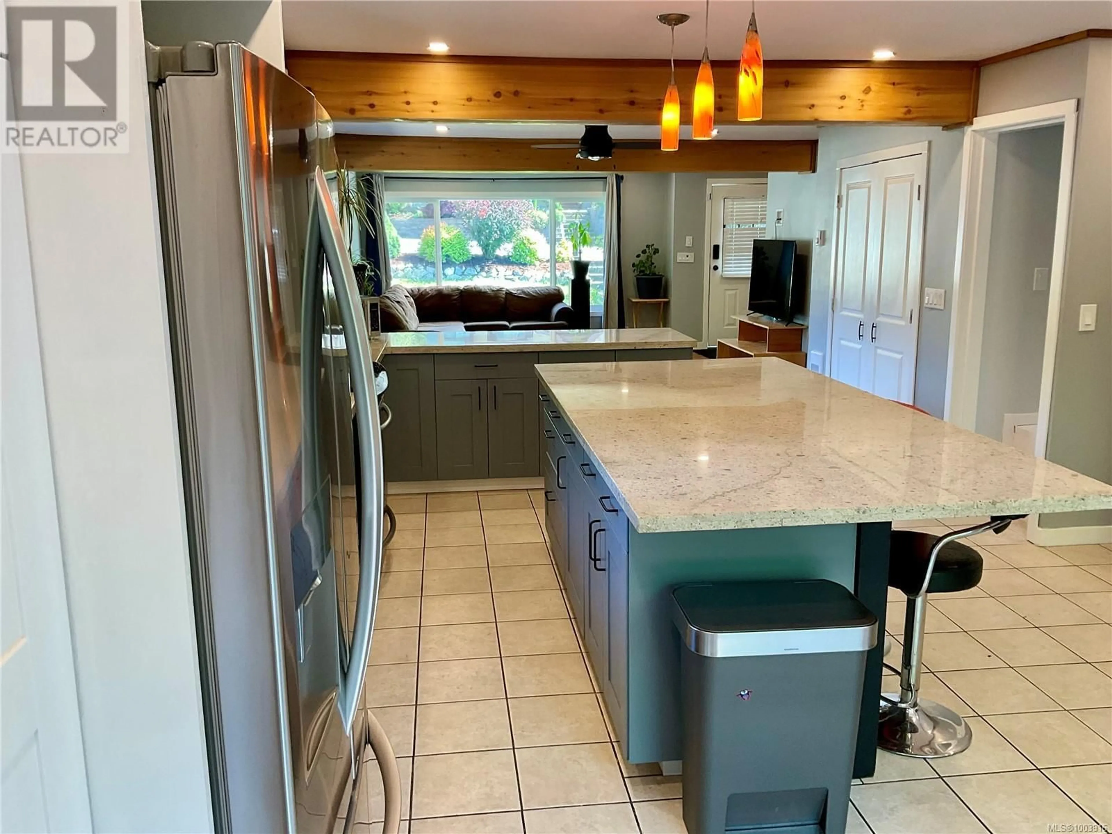 Open concept kitchen, ceramic/tile floor for 65 STONE AVENUE, Lake Cowichan British Columbia V0R2G0