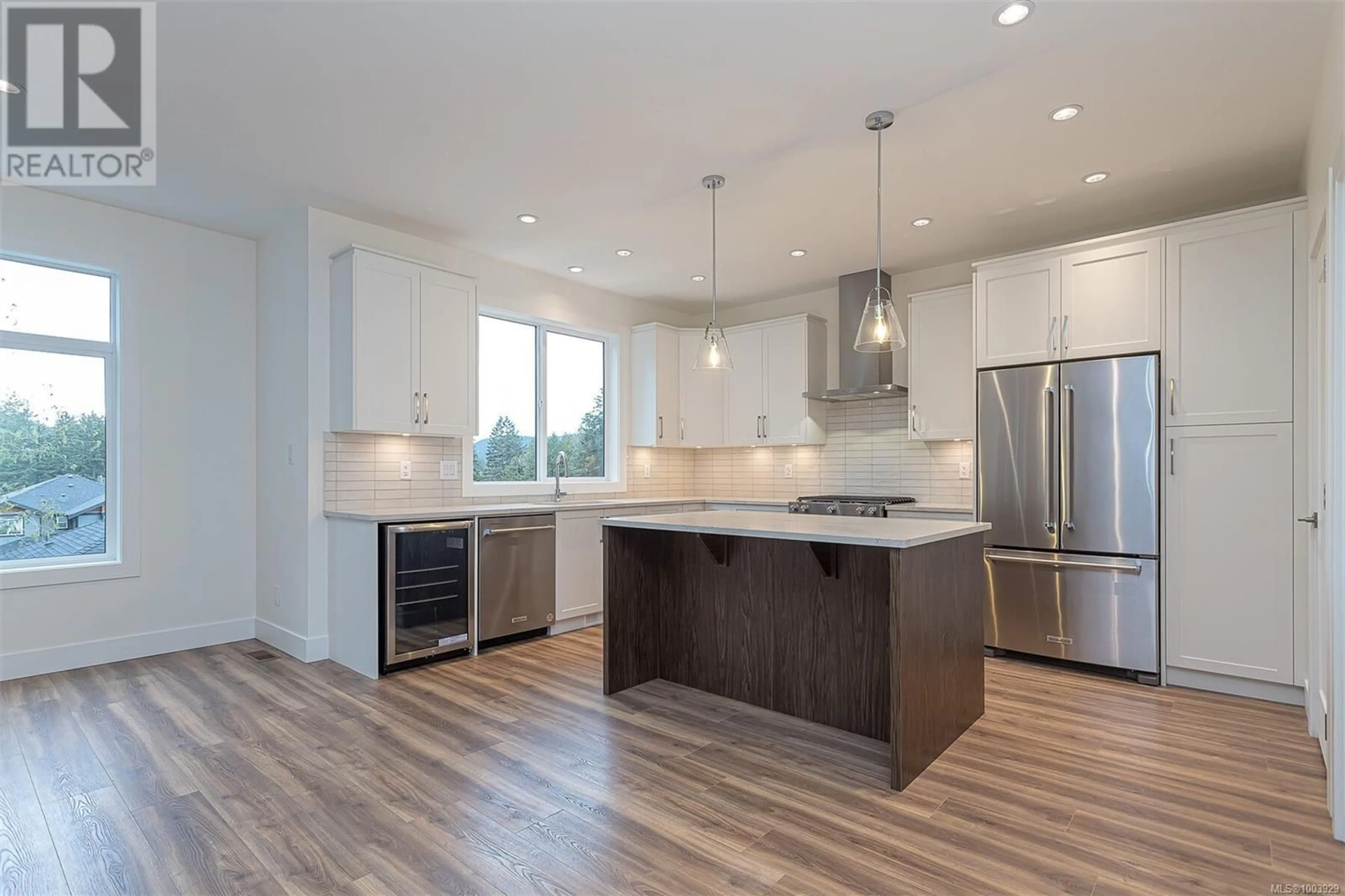 Open concept kitchen, wood/laminate floor for 1252 ASHMORE TERRACE, Langford British Columbia V9C0S6