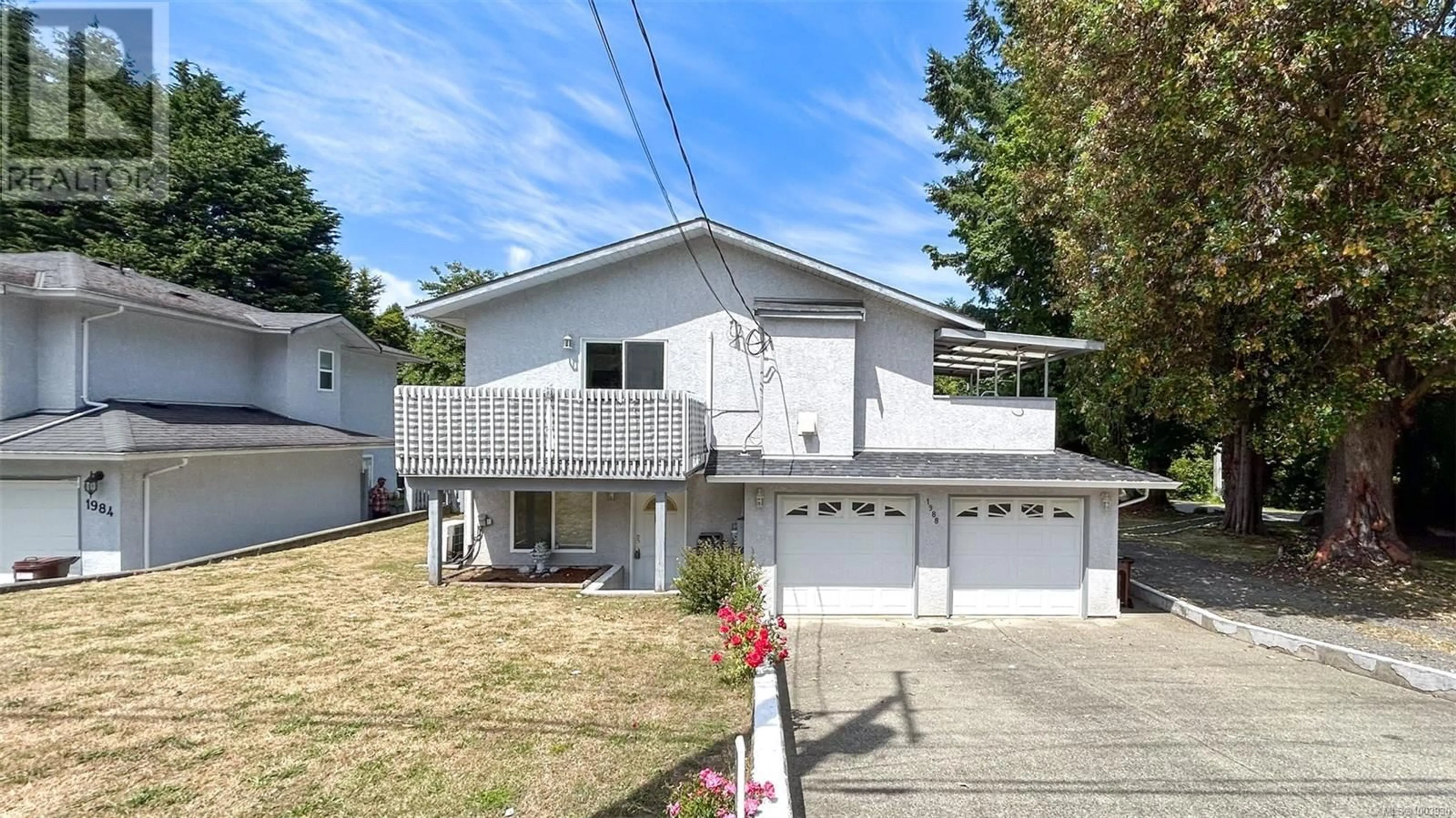 Home with vinyl exterior material, street for 1988 MCTAVISH ROAD, North Saanich British Columbia V8L1C9