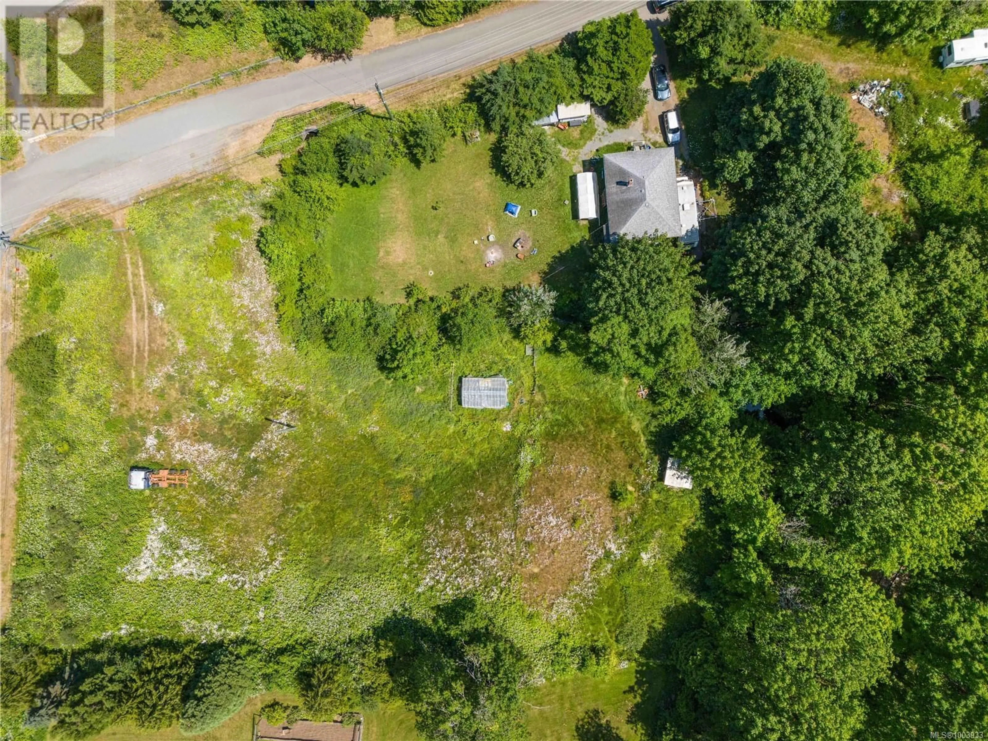 A pic from outside/outdoor area/front of a property/back of a property/a pic from drone, forest/trees view for 1551 FRAMES ROAD, Nanaimo British Columbia V9R6R3
