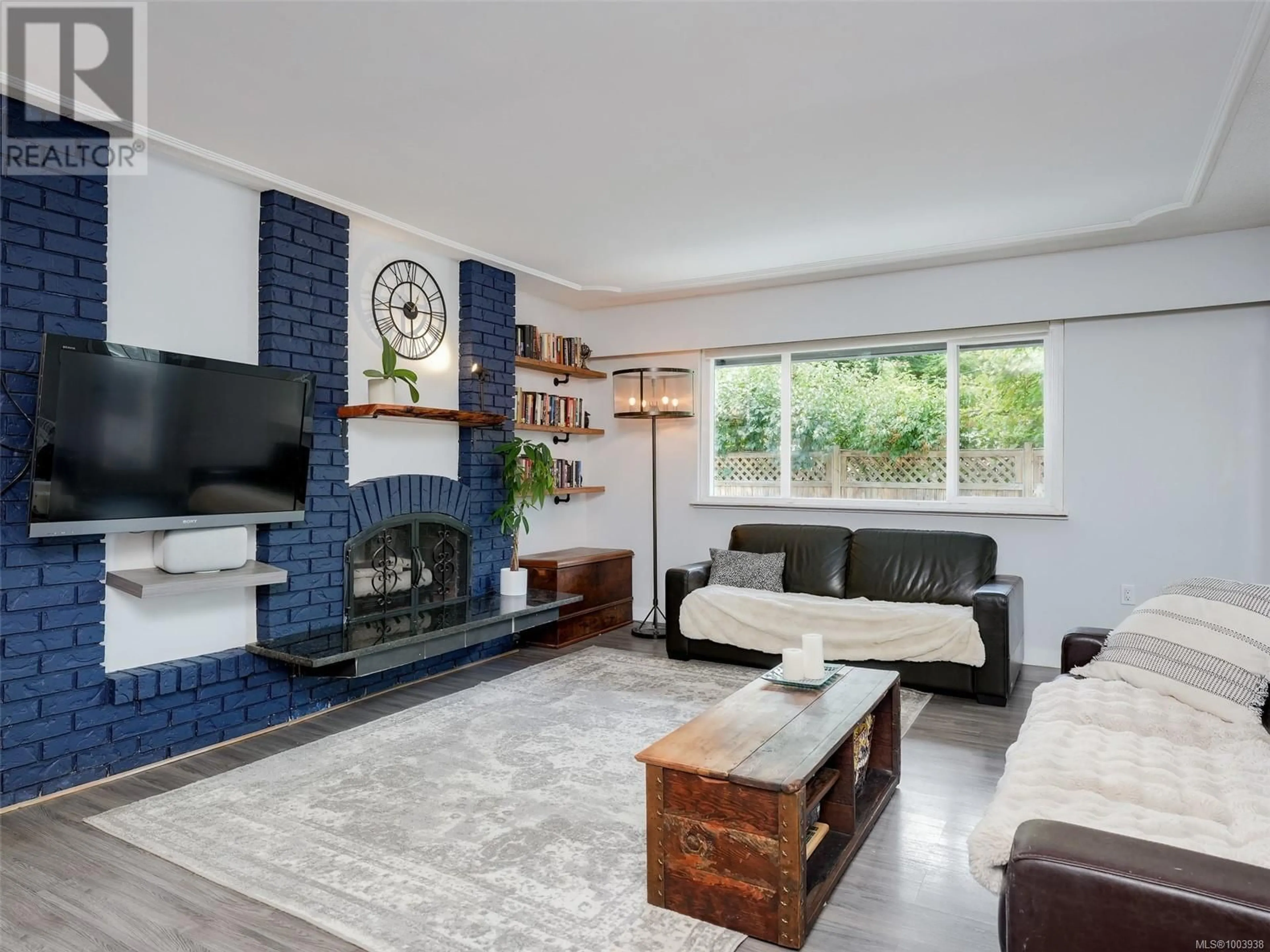 Living room with furniture, ceramic/tile floor for 105 - 3244 SEATON STREET, Saanich British Columbia V8Z3V7