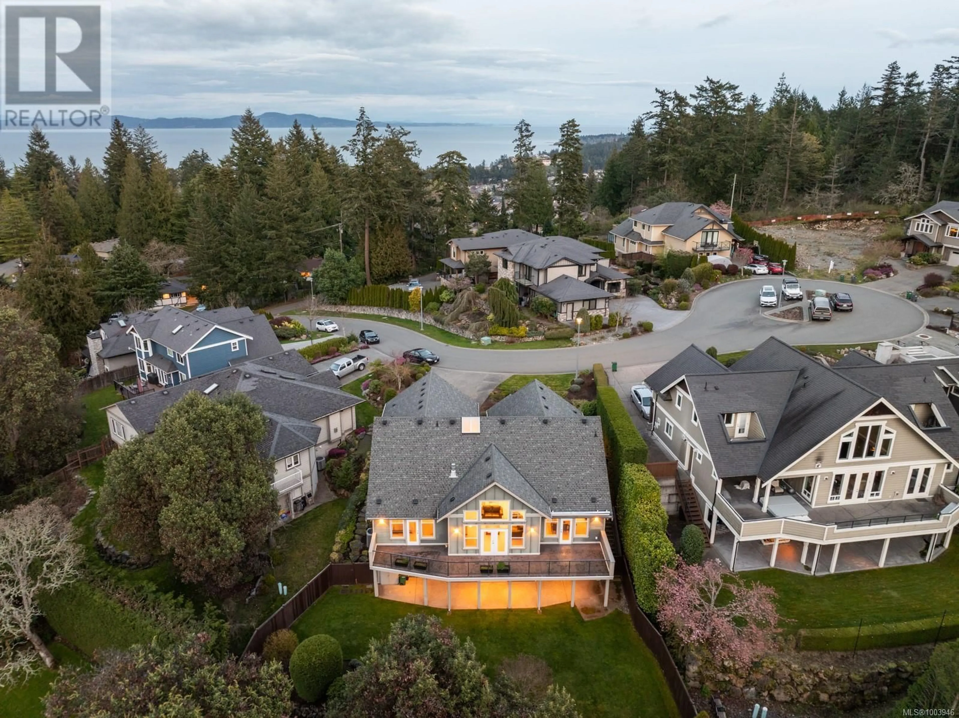 A pic from outside/outdoor area/front of a property/back of a property/a pic from drone, water/lake/river/ocean view for 724 BOSSI PLACE, Saanich British Columbia V8Y0A1