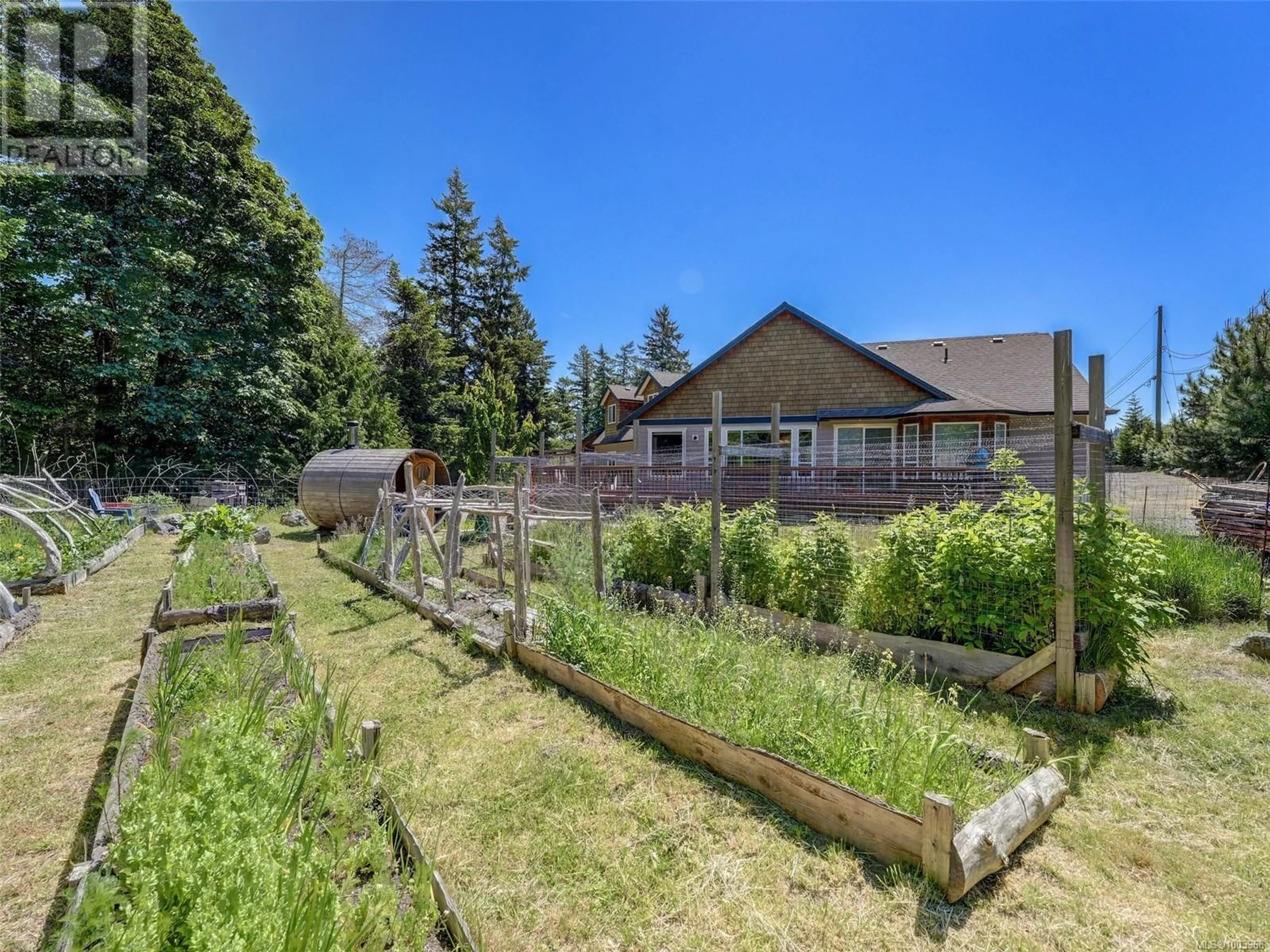 A pic from outside/outdoor area/front of a property/back of a property/a pic from drone, unknown for 7288 THELMITA PLACE, Sooke British Columbia V9Z0J1