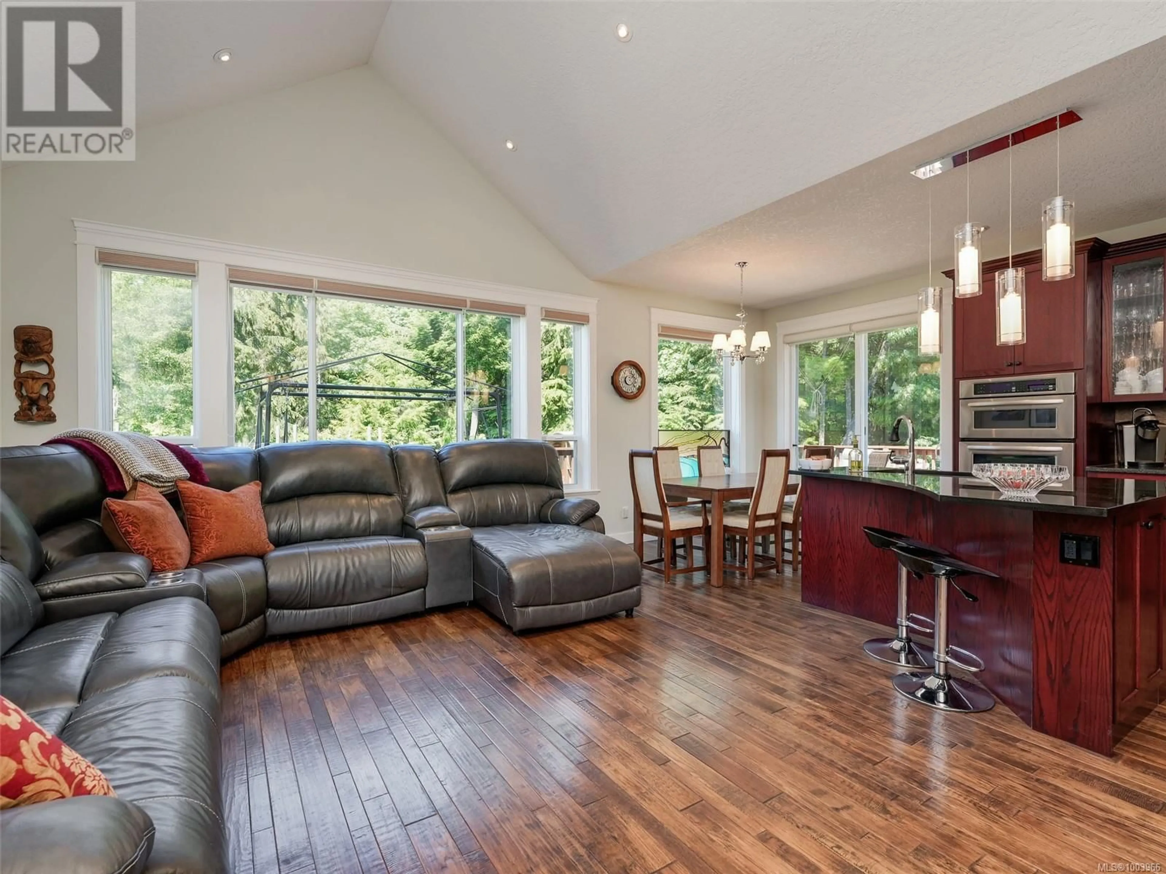 Open concept kitchen, wood/laminate floor for 7288 THELMITA PLACE, Sooke British Columbia V9Z0J1