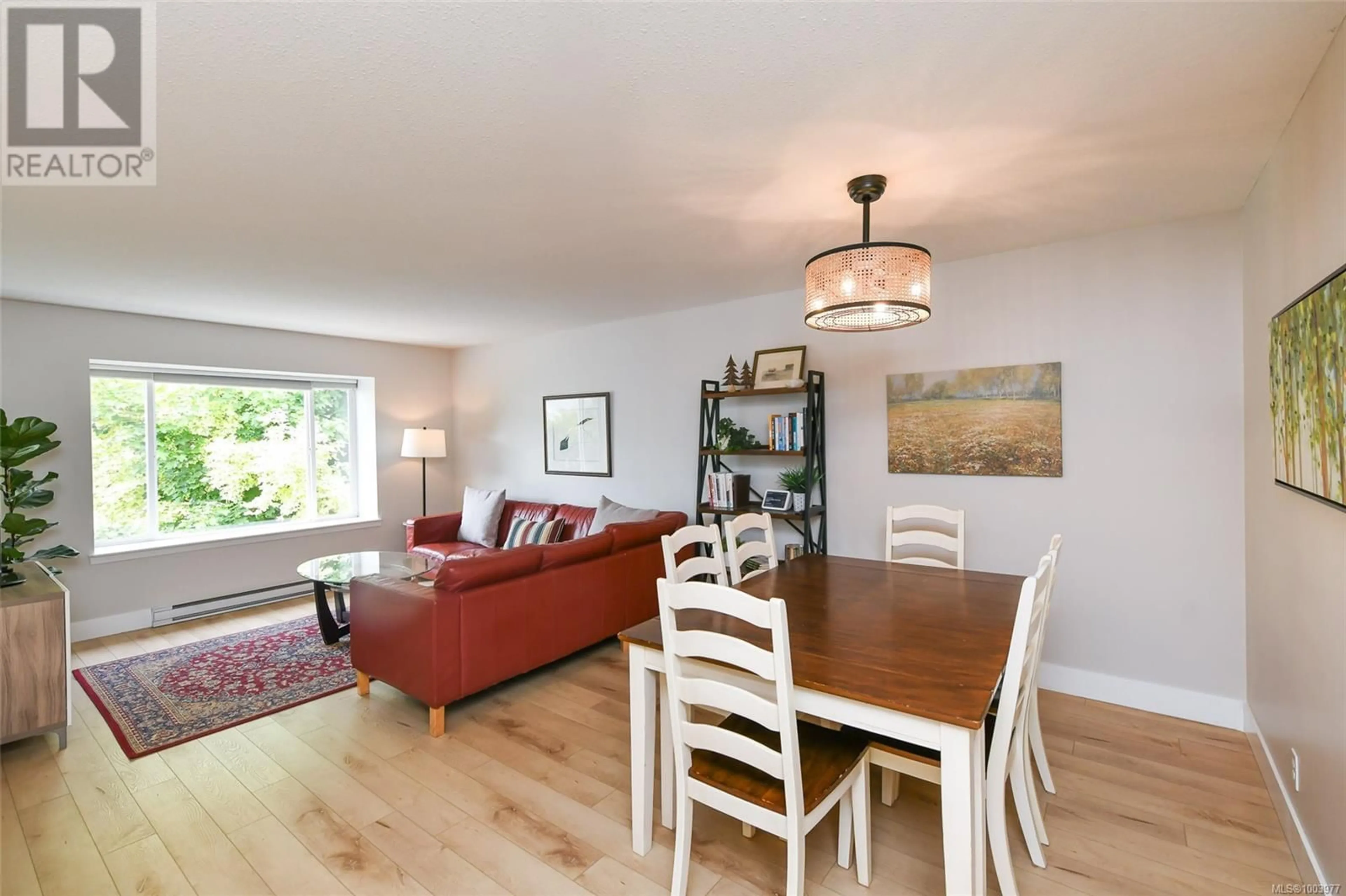Living room with furniture, wood/laminate floor for 1966 13TH STREET, Courtenay British Columbia V9N8Y6