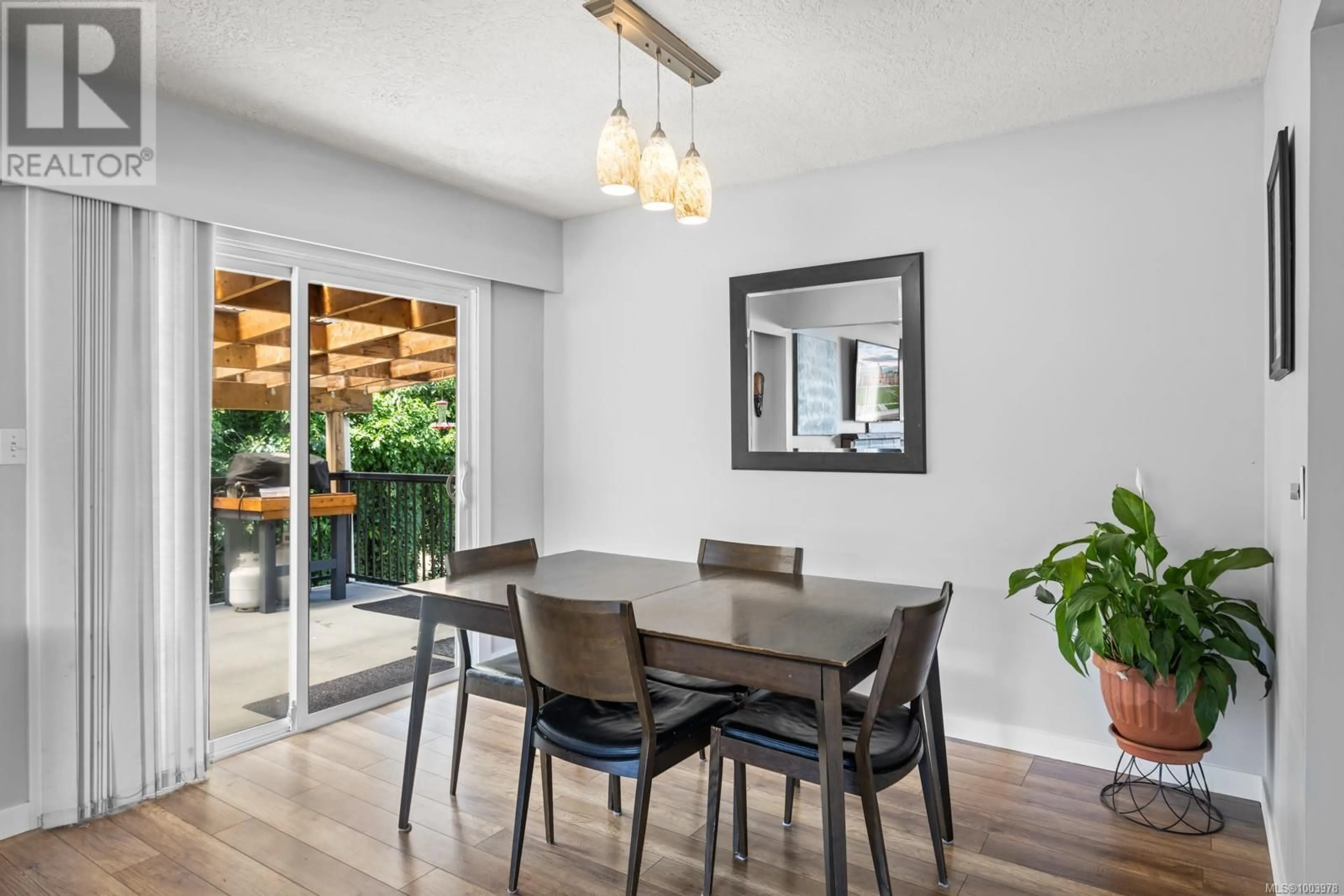 Dining room, wood/laminate floor for 2640 SOOKE ROAD, Langford British Columbia V9B1Y4