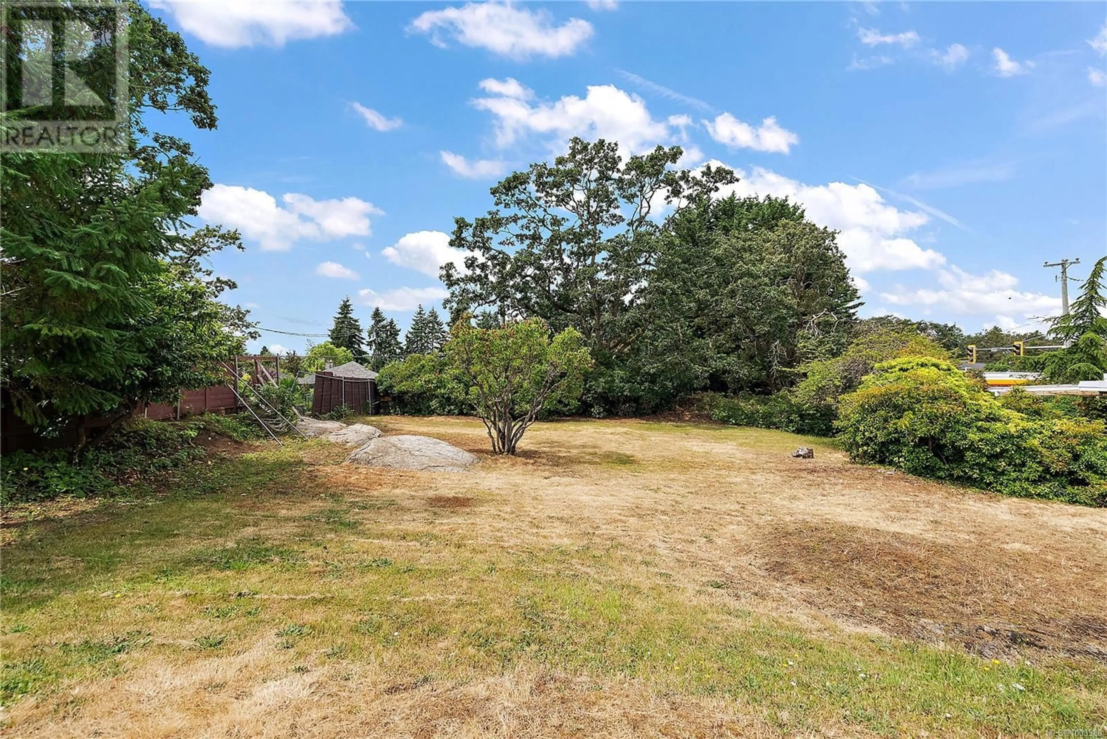 A pic from outside/outdoor area/front of a property/back of a property/a pic from drone, forest/trees view for 3749 QUADRA STREET, Saanich British Columbia V8X1H5