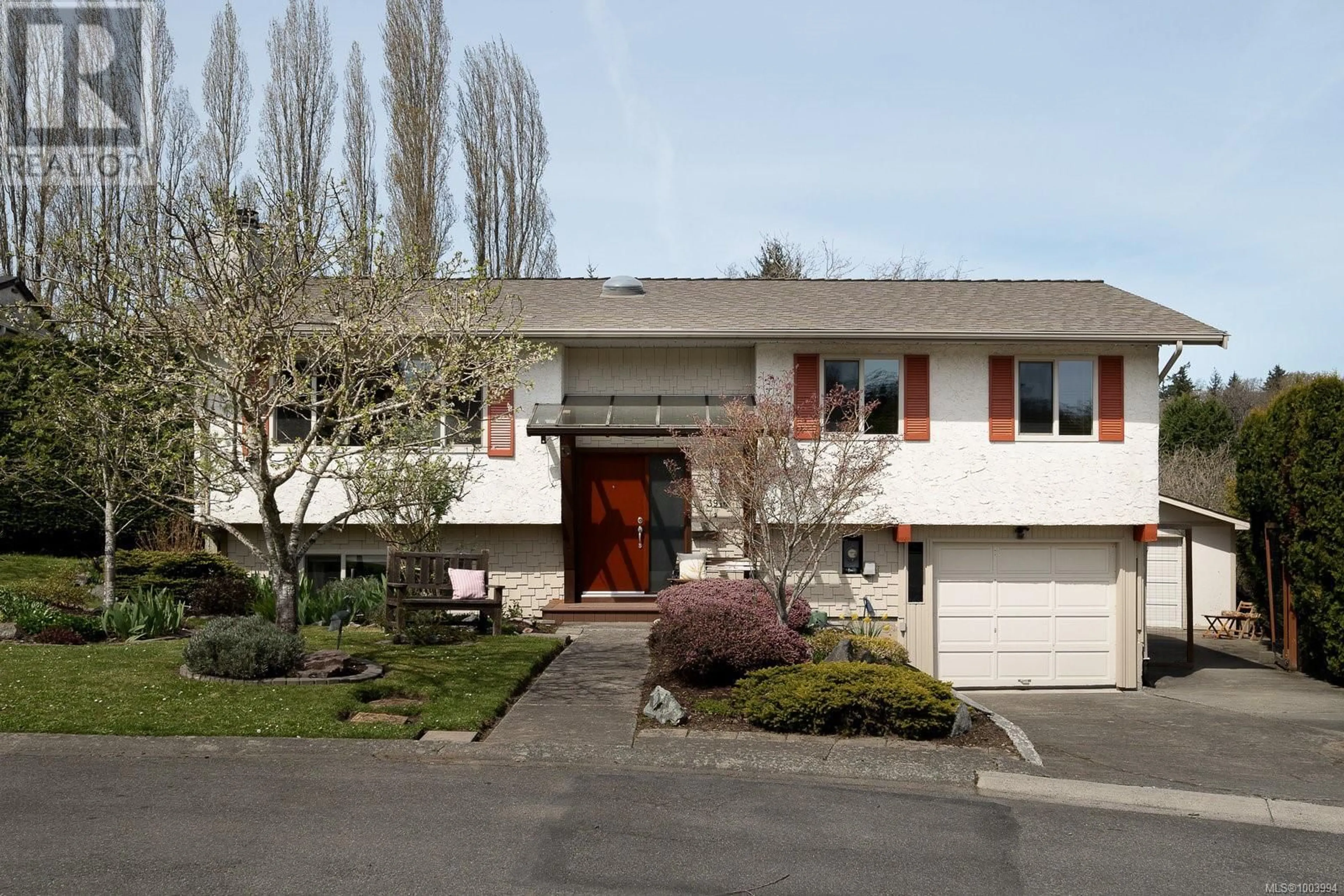 Home with vinyl exterior material, street for 3916 LANDIS PLACE, Saanich British Columbia V8X4C1