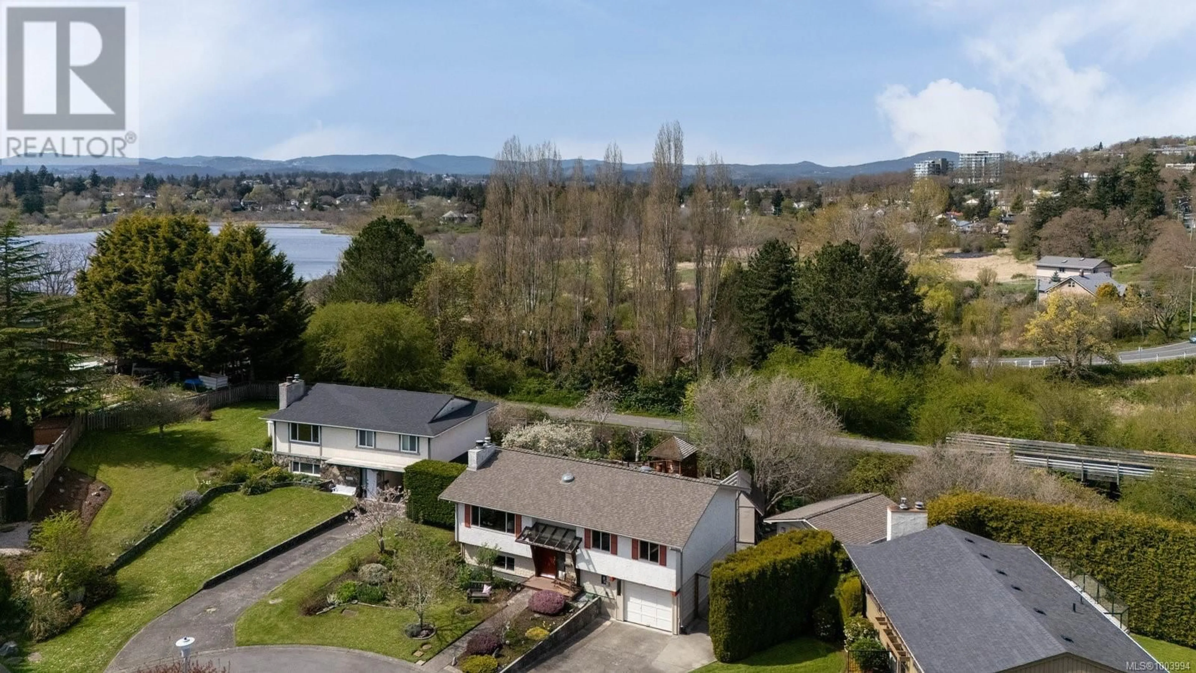 A pic from outside/outdoor area/front of a property/back of a property/a pic from drone, water/lake/river/ocean view for 3916 LANDIS PLACE, Saanich British Columbia V8X4C1