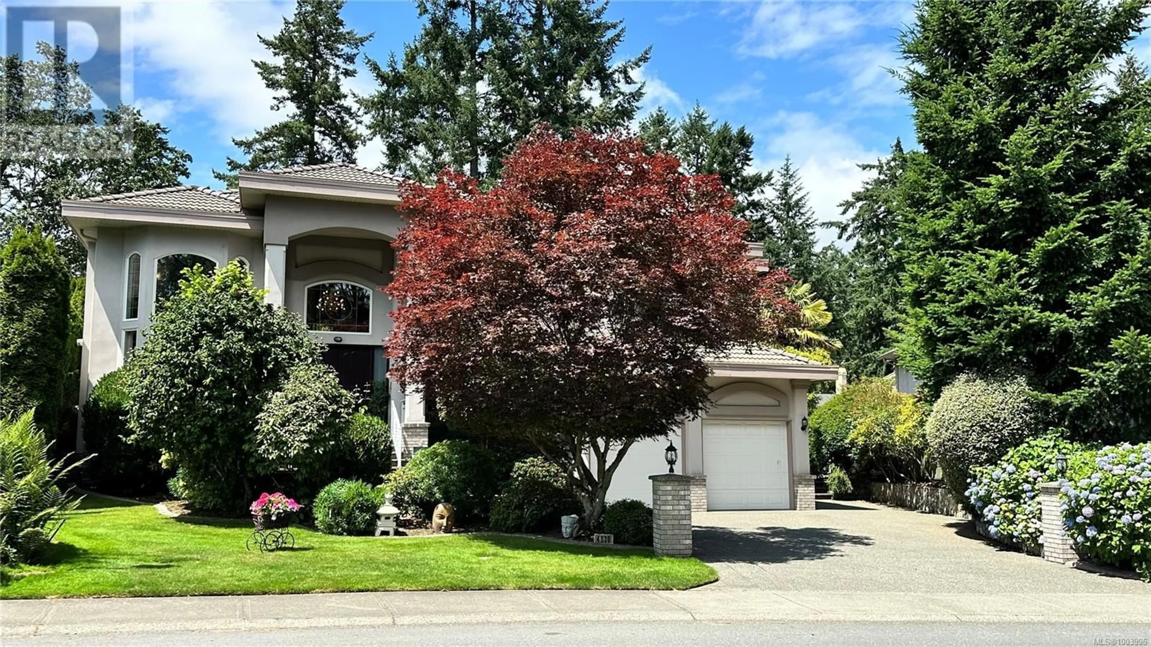 Home with vinyl exterior material, street for 4638 BOULDERWOOD DRIVE, Saanich British Columbia V8Y3G5