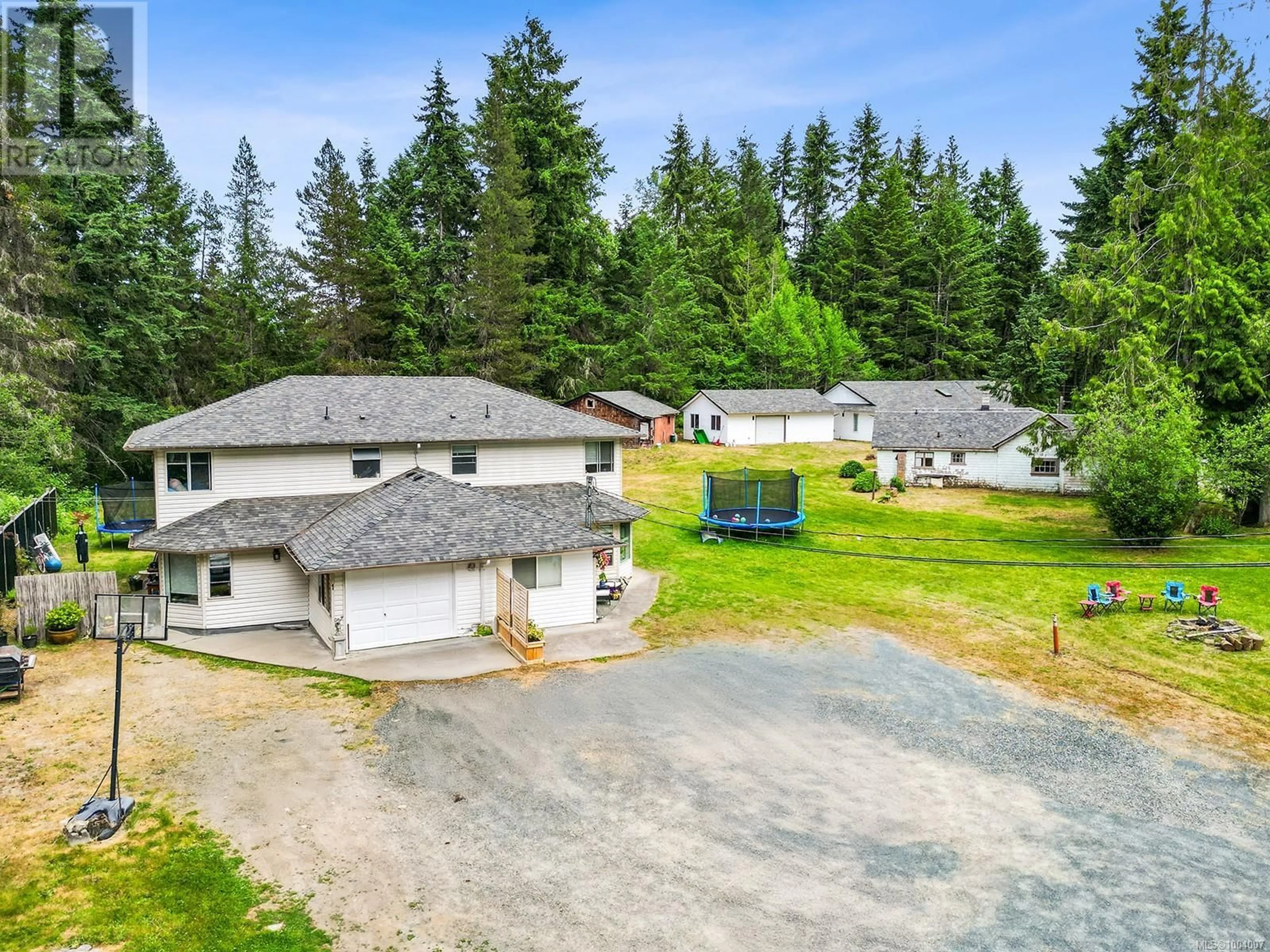A pic from outside/outdoor area/front of a property/back of a property/a pic from drone, unknown for 1533 BRADDOCK ROAD, Errington British Columbia V0R1V0