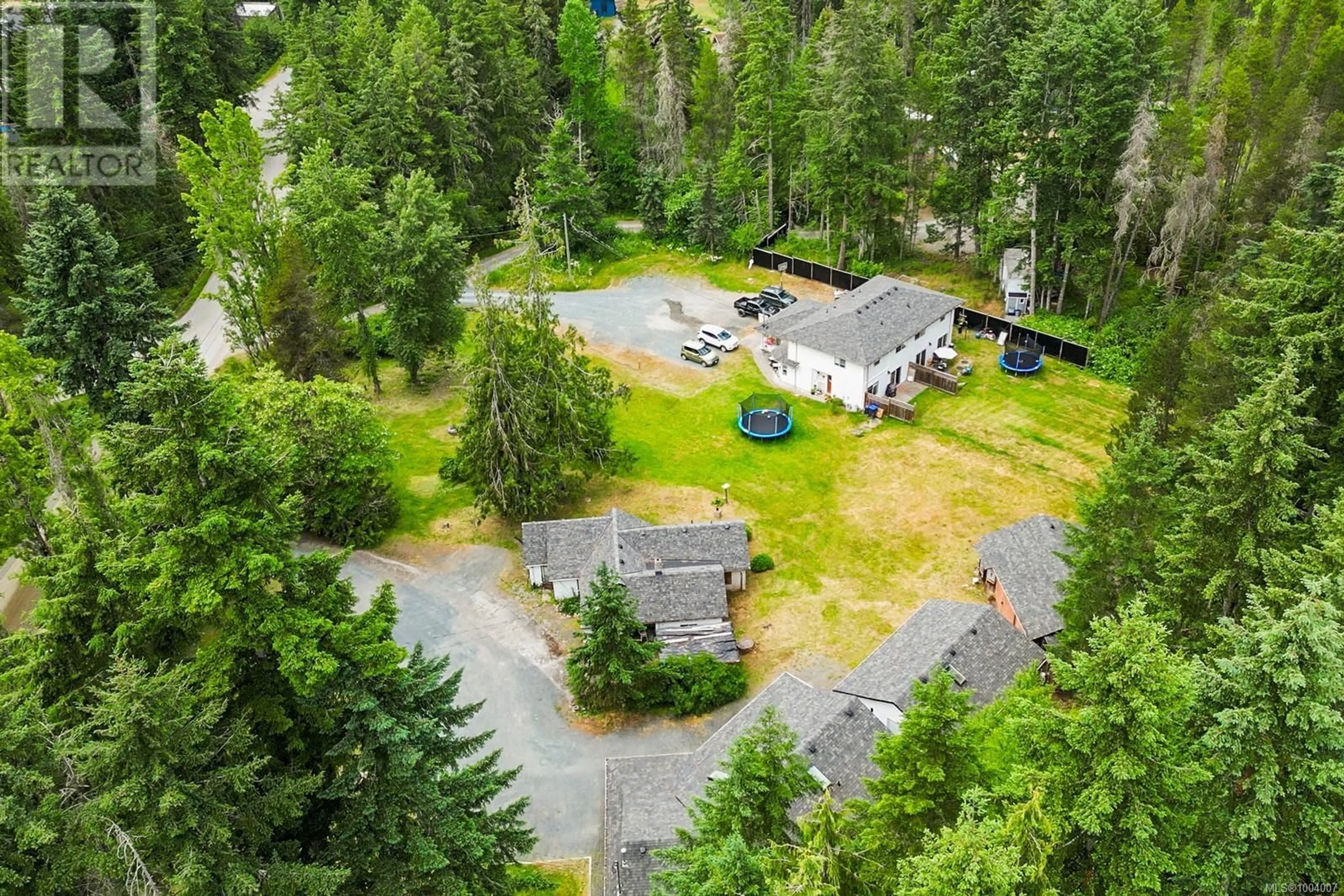 A pic from outside/outdoor area/front of a property/back of a property/a pic from drone, forest/trees view for 1533 BRADDOCK ROAD, Errington British Columbia V0R1V0