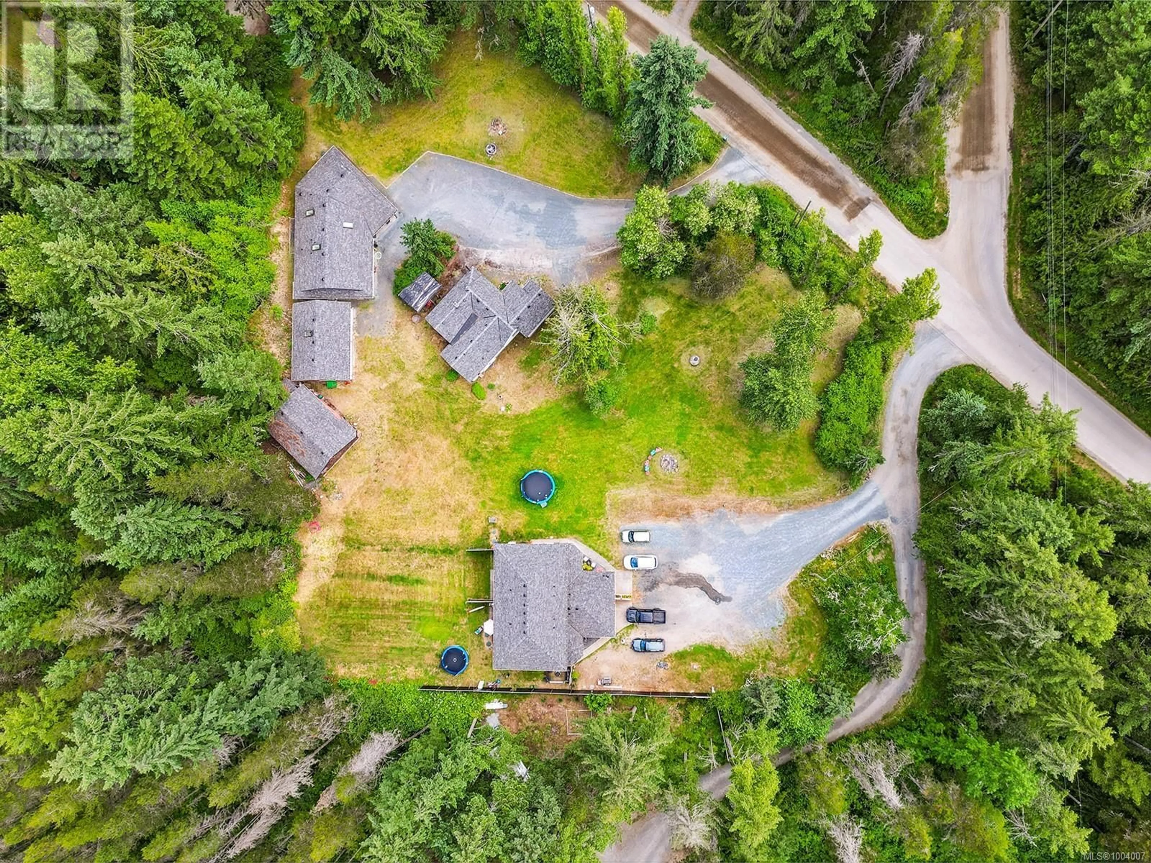 A pic from outside/outdoor area/front of a property/back of a property/a pic from drone, forest/trees view for 1533 BRADDOCK ROAD, Errington British Columbia V0R1V0