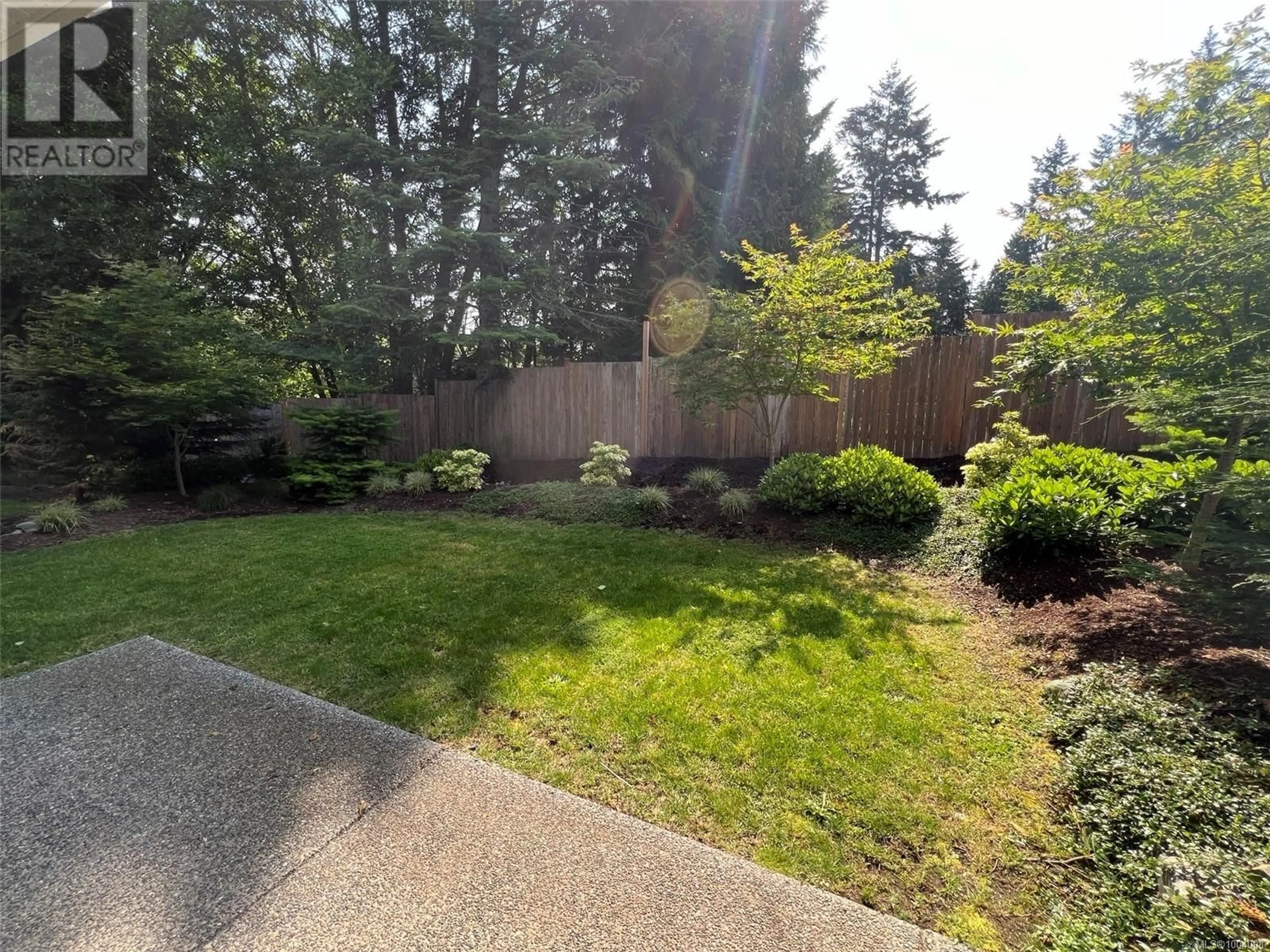 Patio, forest/trees view for 107 - 5160 HAMMOND BAY ROAD, Nanaimo British Columbia V9T5B5