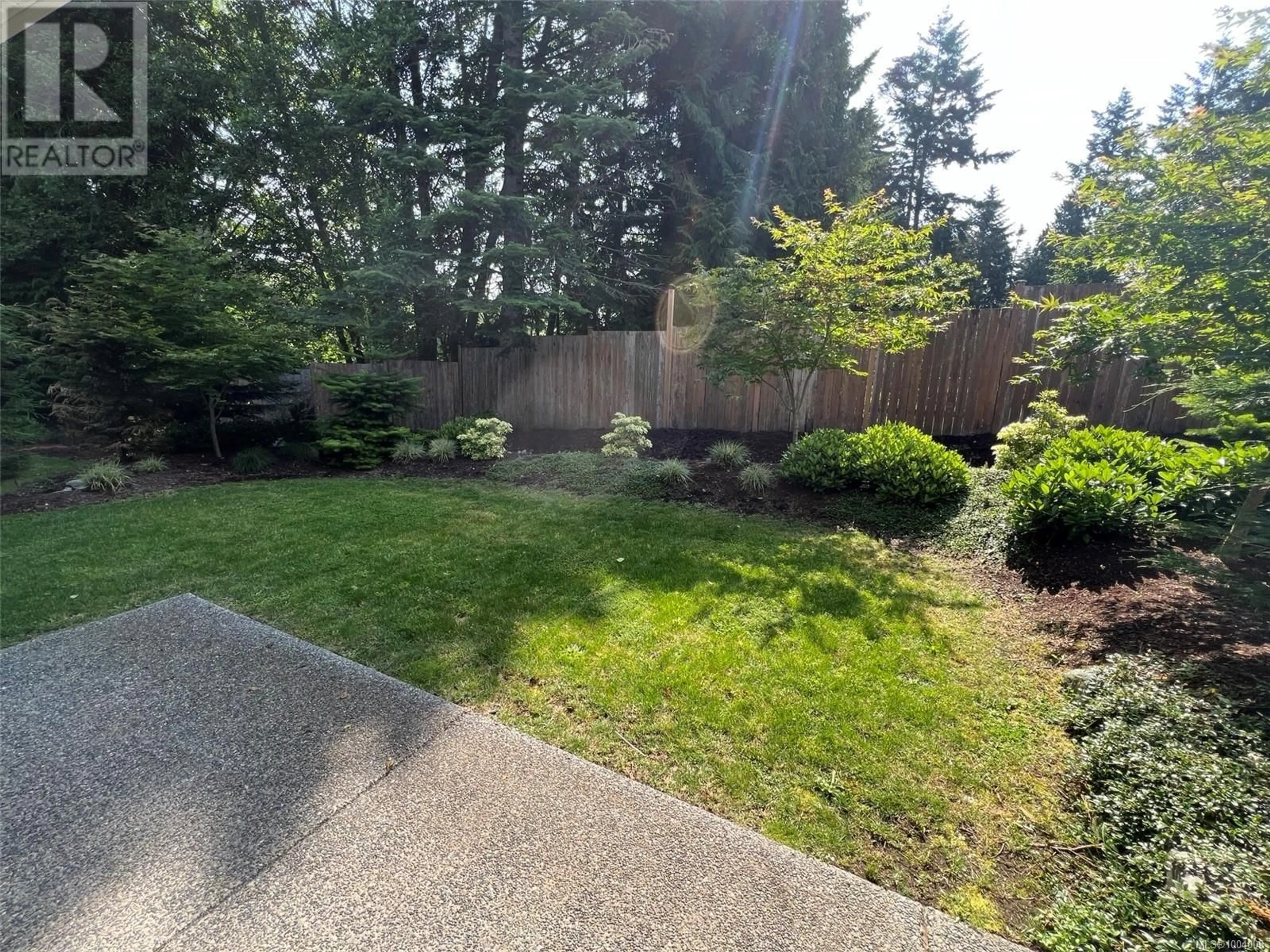 A pic from outside/outdoor area/front of a property/back of a property/a pic from drone, forest/trees view for 107 - 5160 HAMMOND BAY ROAD, Nanaimo British Columbia V9T5B5
