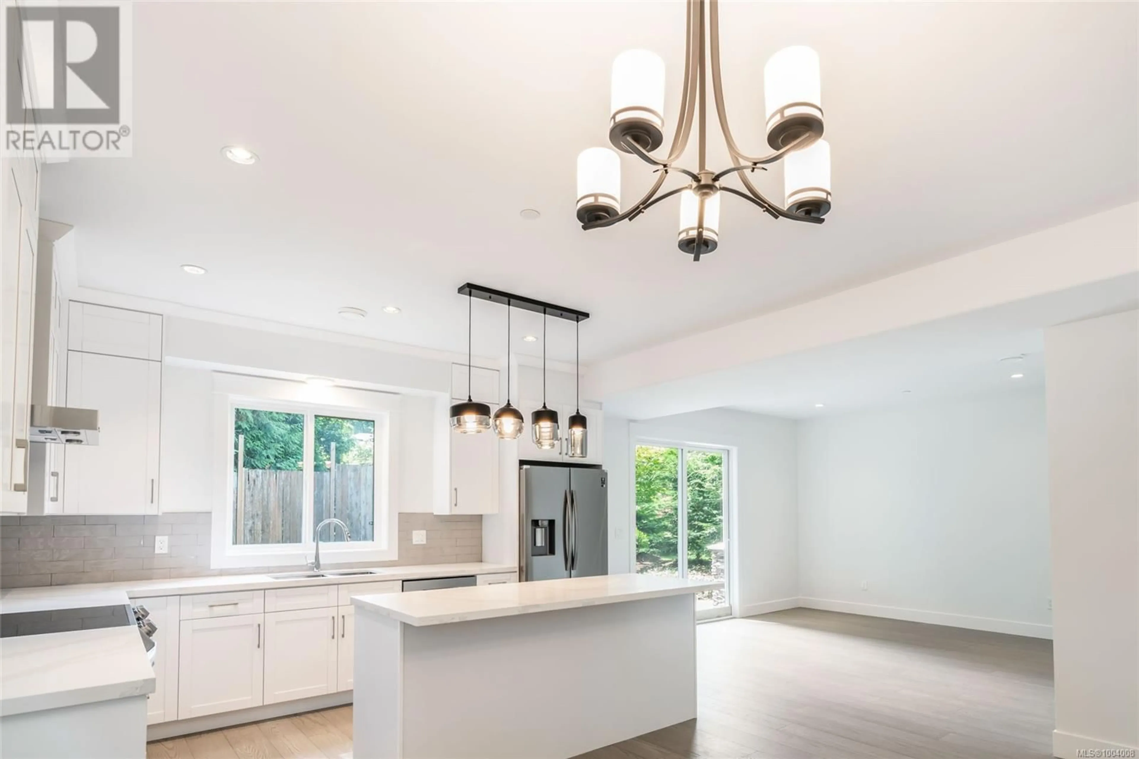 Open concept kitchen, ceramic/tile floor for 107 - 5160 HAMMOND BAY ROAD, Nanaimo British Columbia V9T5B5