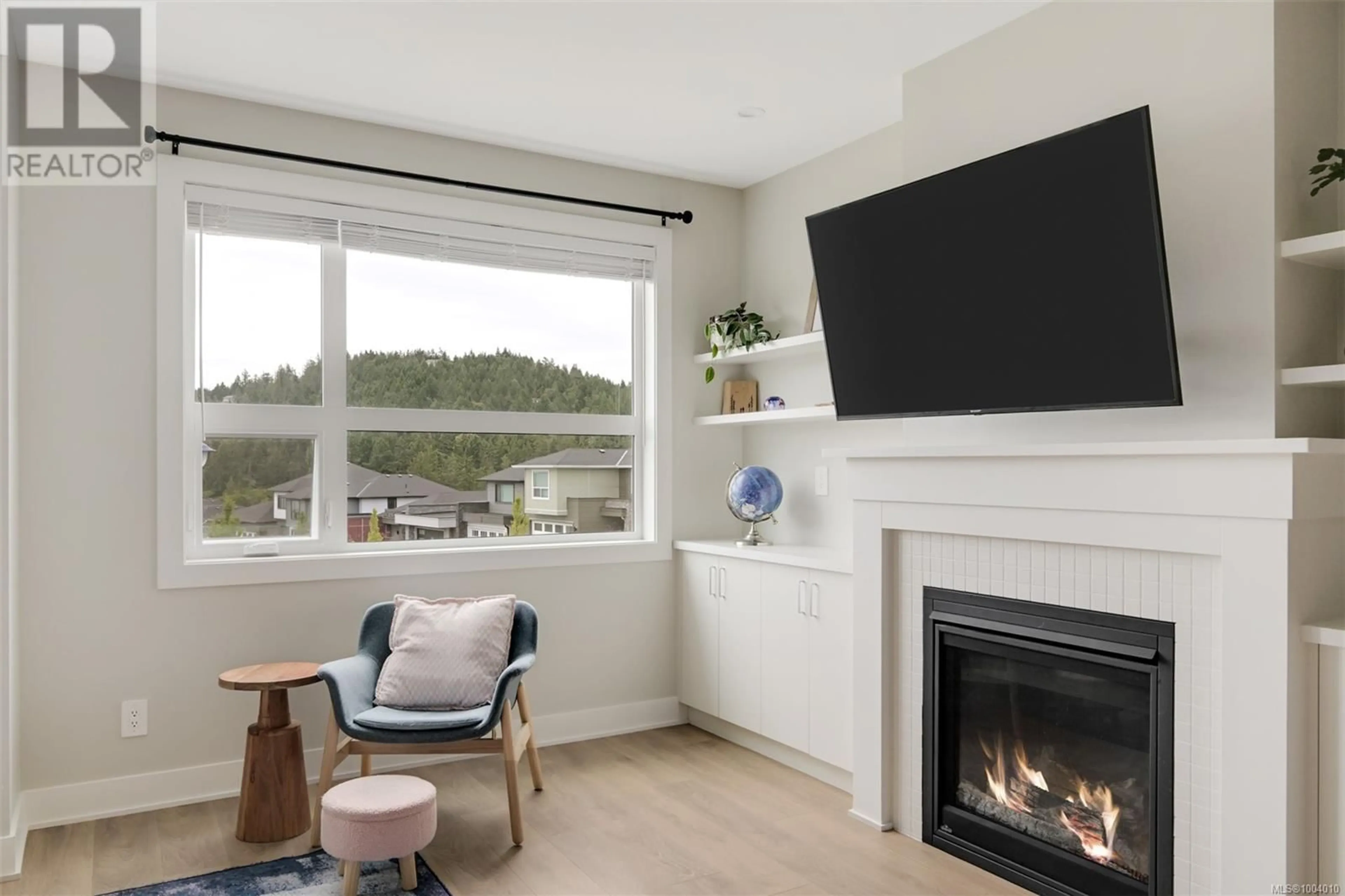 Living room with furniture, wood/laminate floor for 1426 ATLAS DRIVE, Langford British Columbia V9B7A7