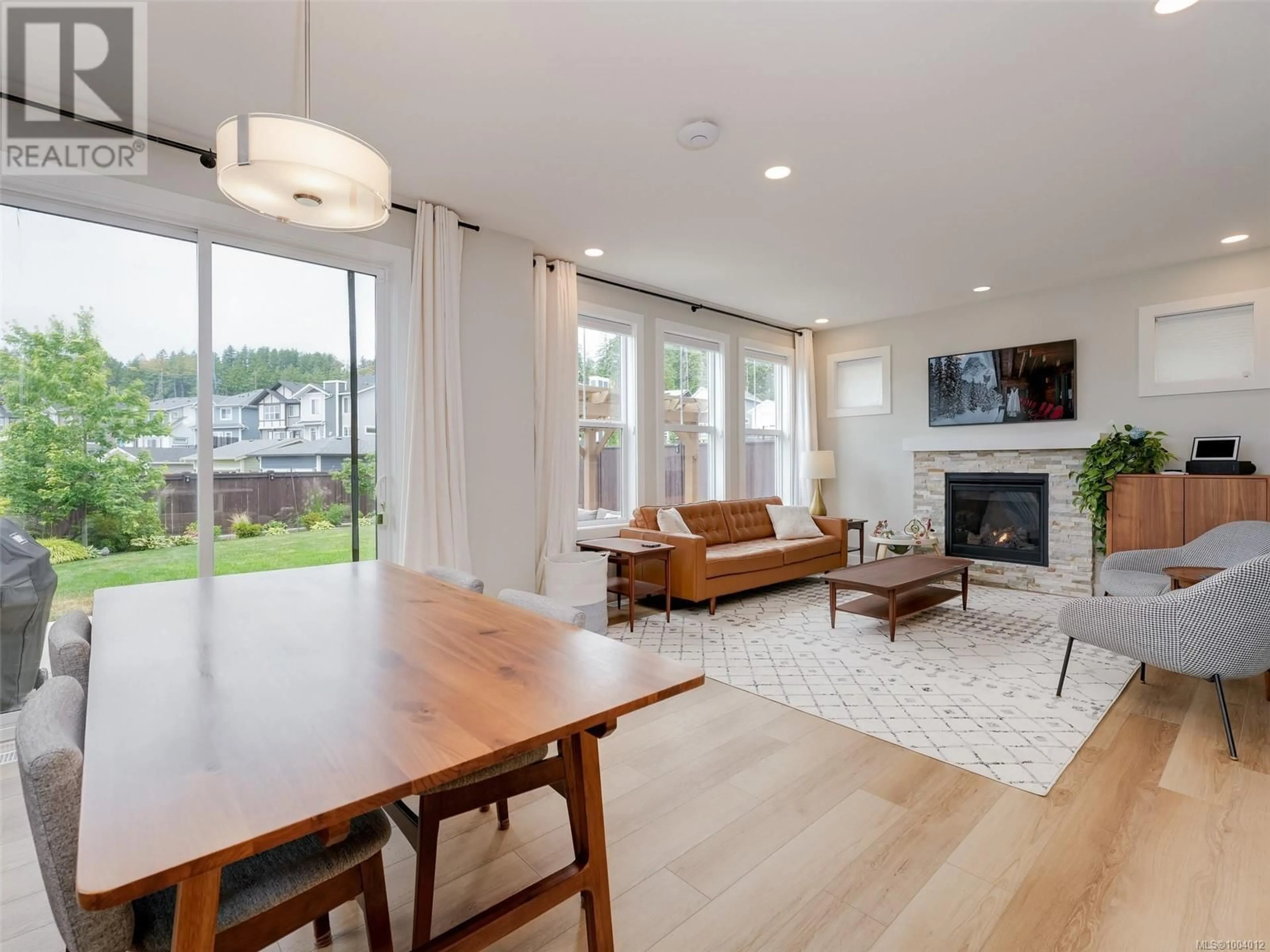 Living room with furniture, wood/laminate floor for 3336 PIPIT PLACE, Colwood British Columbia V0C0P8
