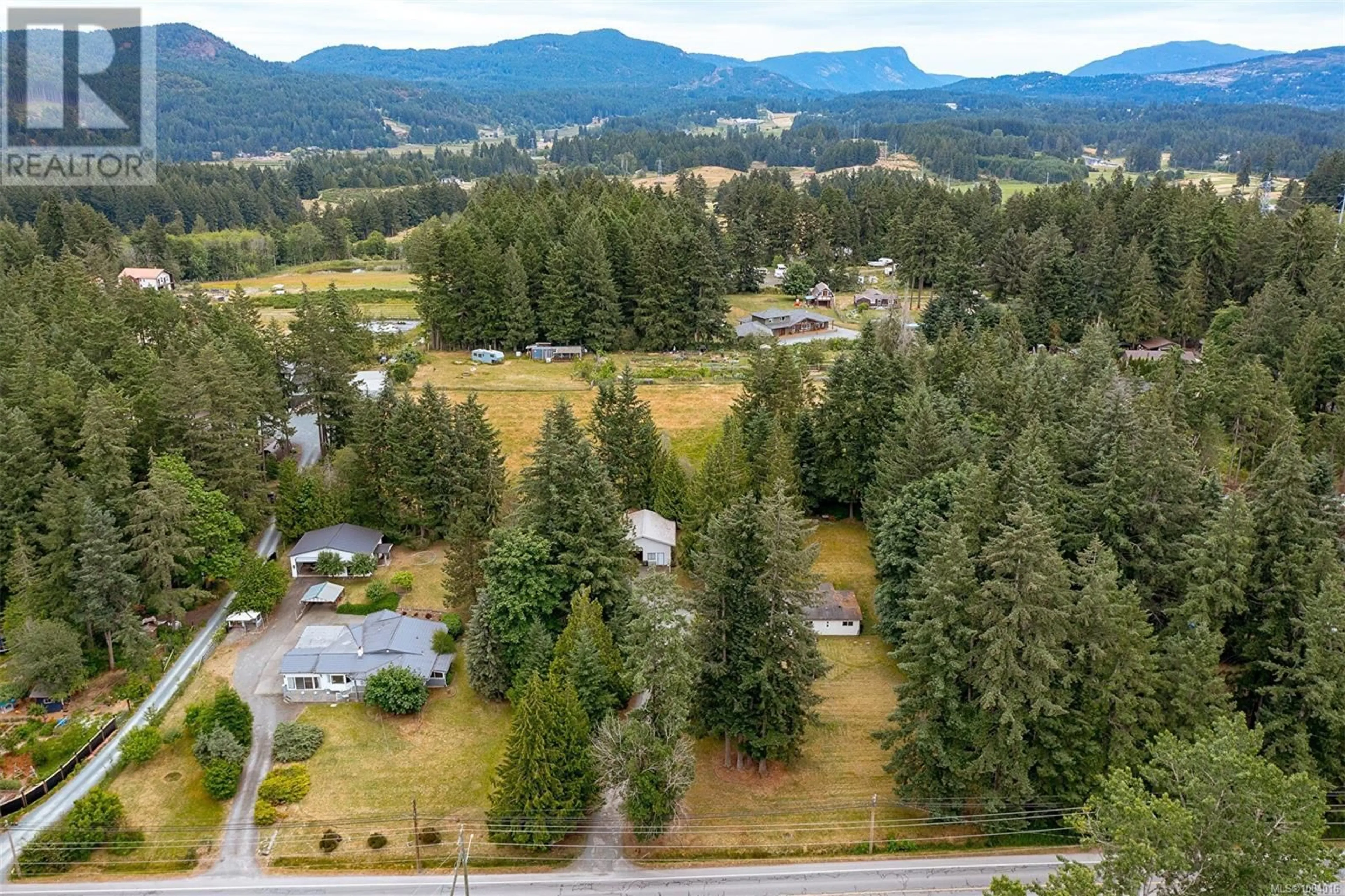 A pic from outside/outdoor area/front of a property/back of a property/a pic from drone, mountain view for BELL MCKINNON ROAD, Duncan British Columbia V9L6B5
