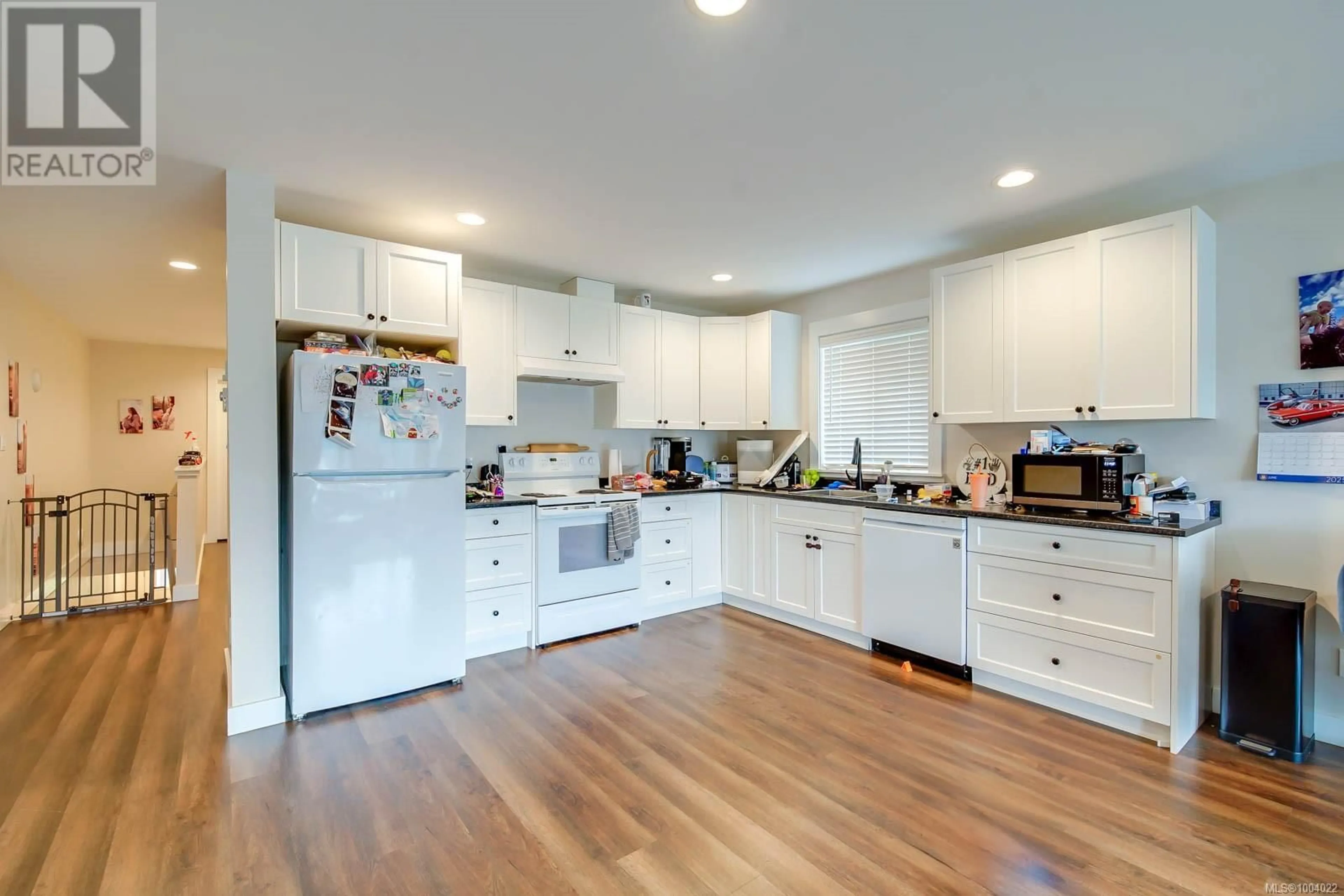 Open concept kitchen, wood/laminate floor for 2615 5TH AVENUE, Port Alberni British Columbia V9Y2G2