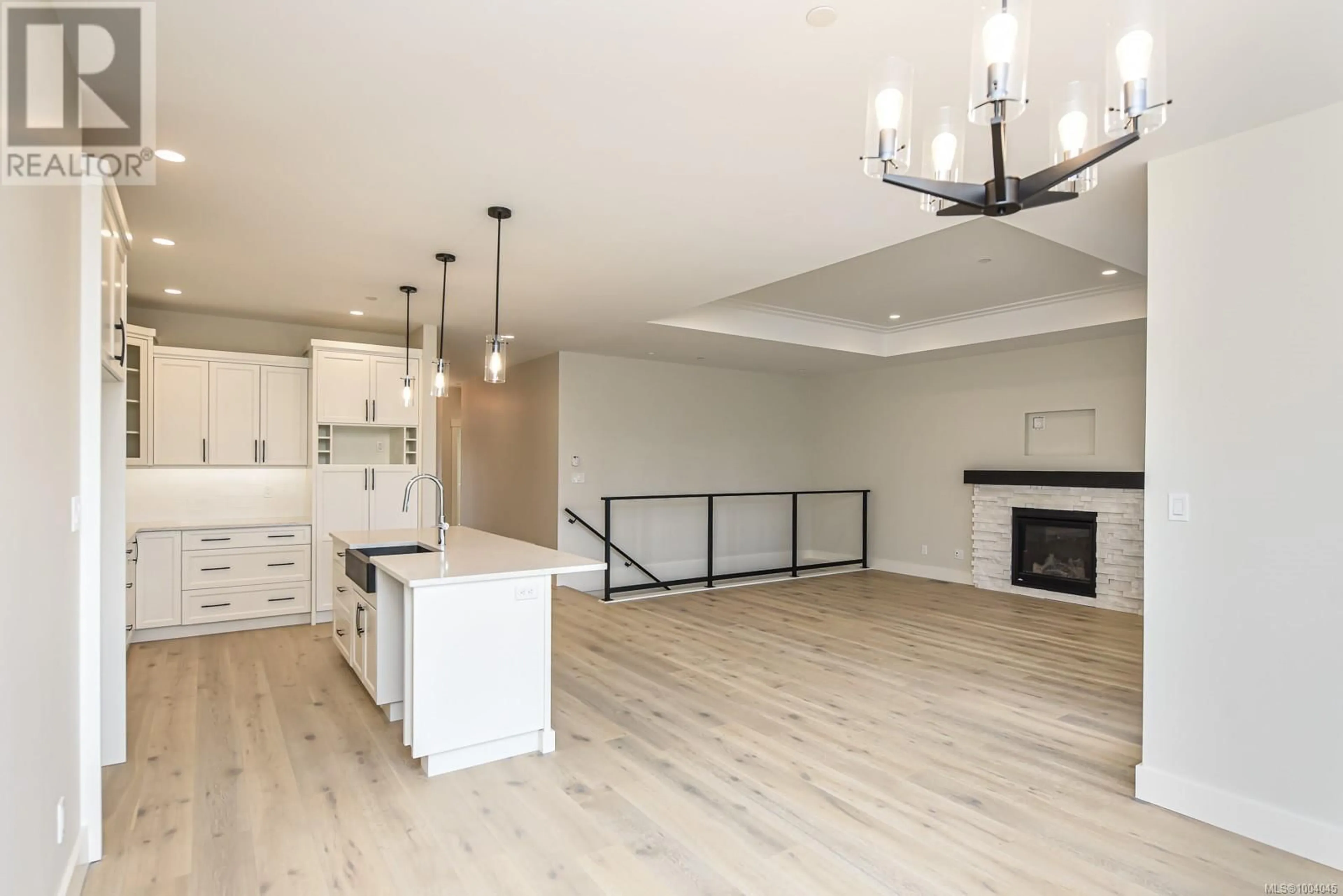 Open concept kitchen, wood/laminate floor for 1834 CROWN ISLE BOULEVARD, Courtenay British Columbia V9N9X5