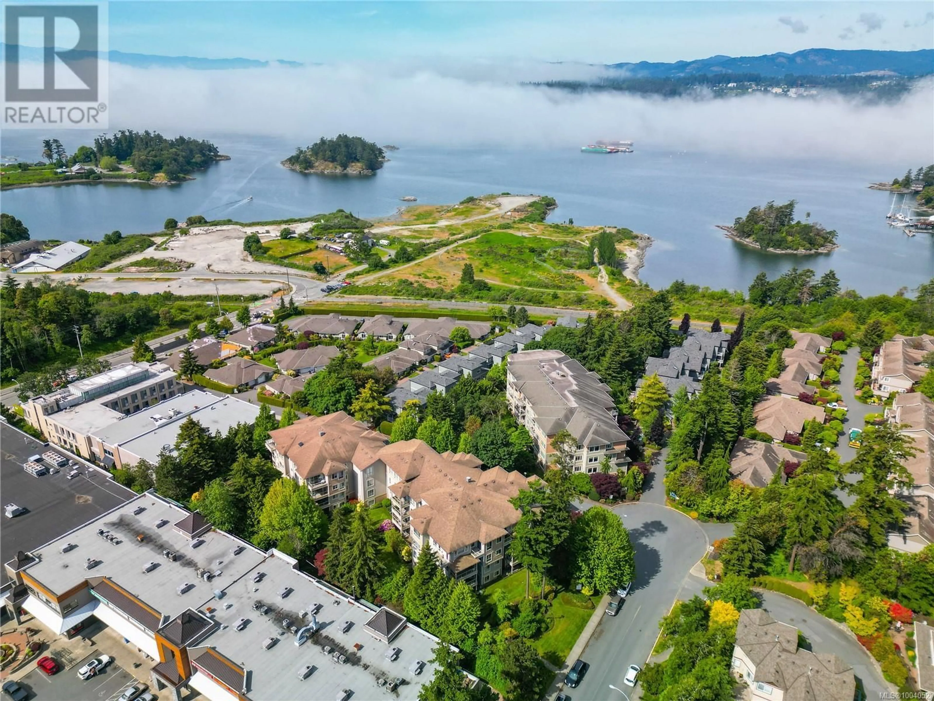 A pic from outside/outdoor area/front of a property/back of a property/a pic from drone, water/lake/river/ocean view for 104 - 121 ALDERSMITH PLACE, View Royal British Columbia V9A7M7