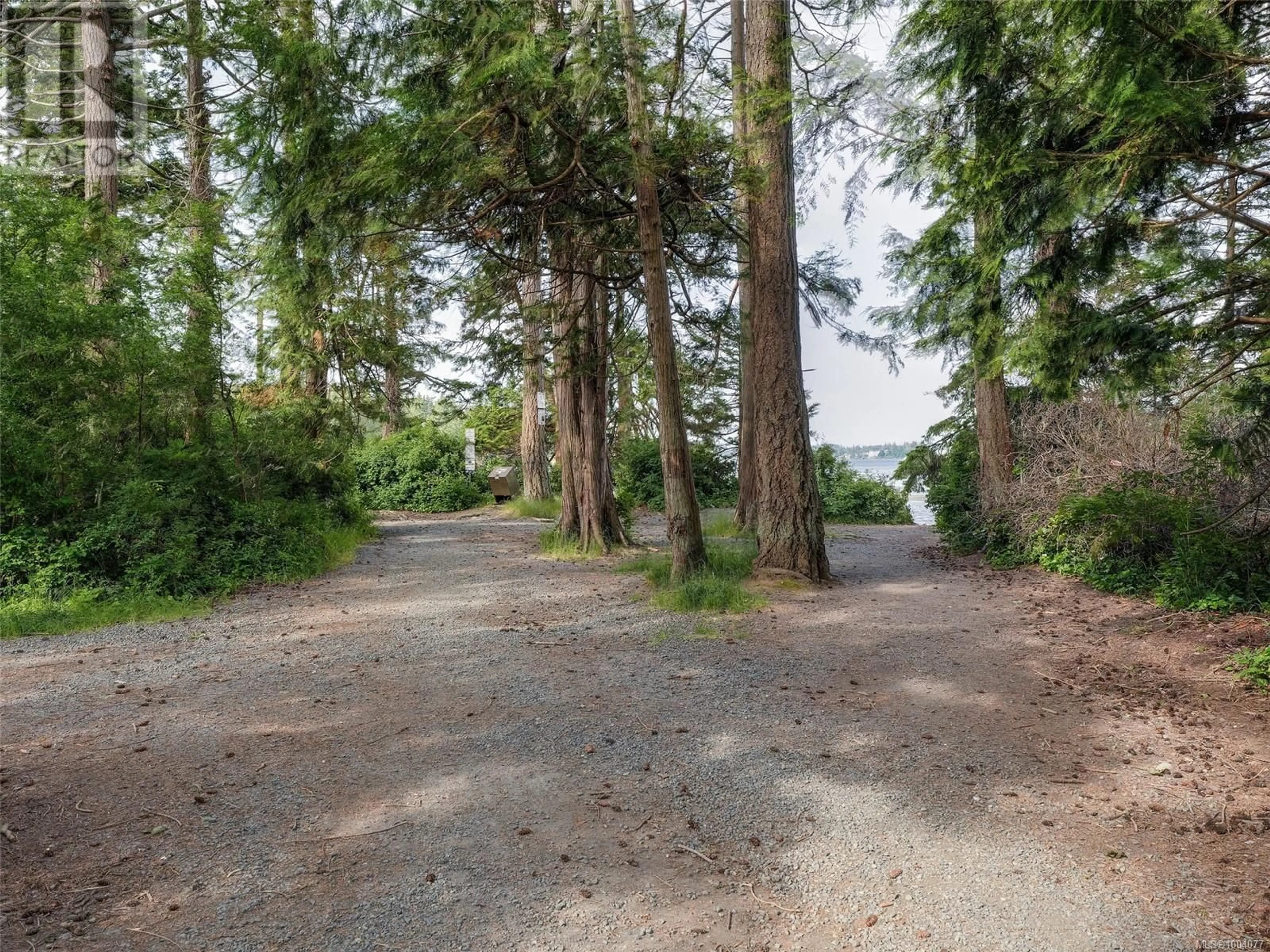 A pic from outside/outdoor area/front of a property/back of a property/a pic from drone, forest/trees view for 2 - 1956 GLENIDLE ROAD, Sooke British Columbia V9Z0B2