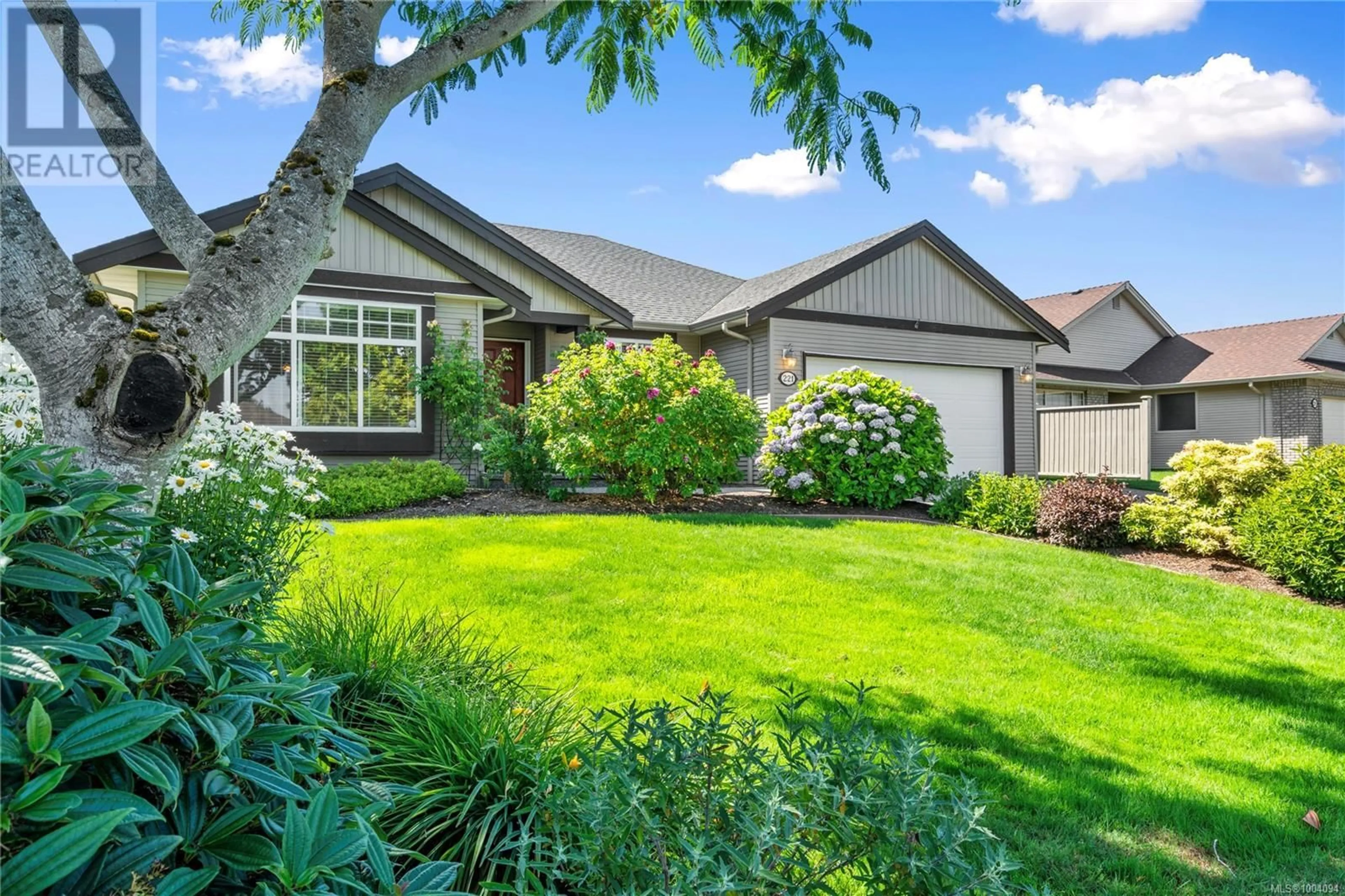 Home with vinyl exterior material, street for 221 LODGEPOLE DRIVE, Parksville British Columbia V9P2Z1