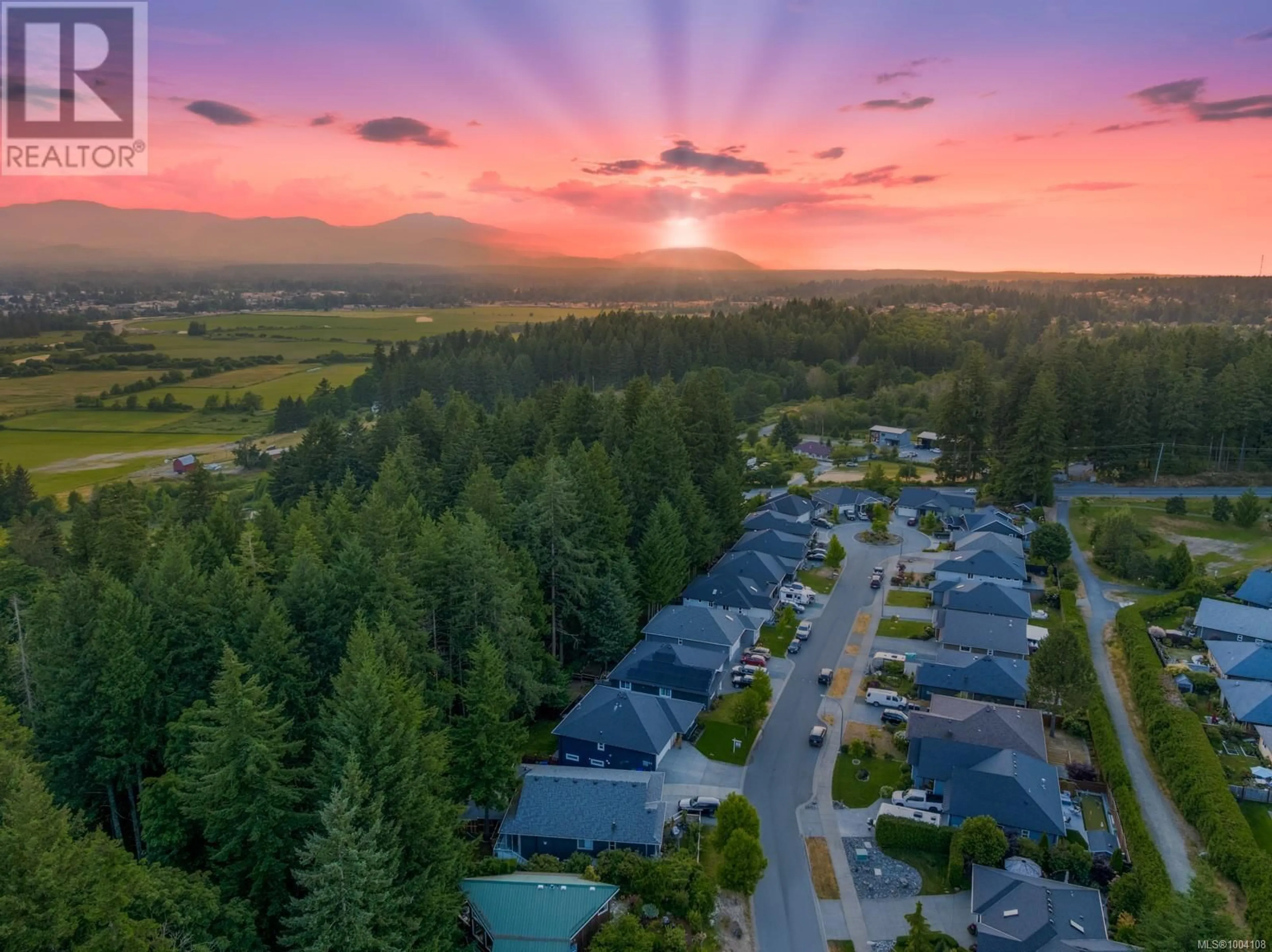 A pic from outside/outdoor area/front of a property/back of a property/a pic from drone, mountain view for 2451 DAKOTA PLACE, Comox British Columbia V9M0B9