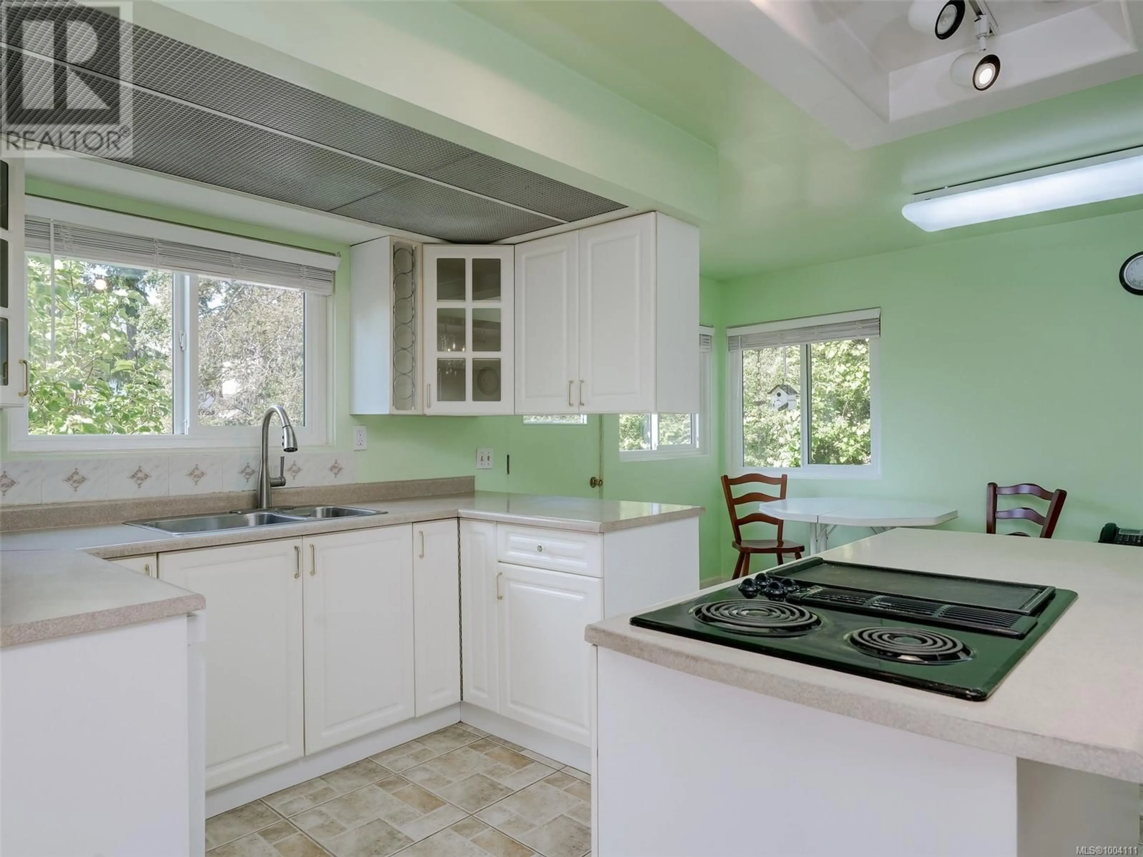 Open concept kitchen, ceramic/tile floor for 1611 CEDAR AVENUE, Saanich British Columbia V8P1W8